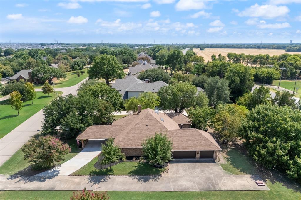 403 Riva Ridge Wylie, TX 75098 - Photo 28 of 32 Traditional architectural style featuring a Level 4 roof, attached three-car garage with plenty of parking space!