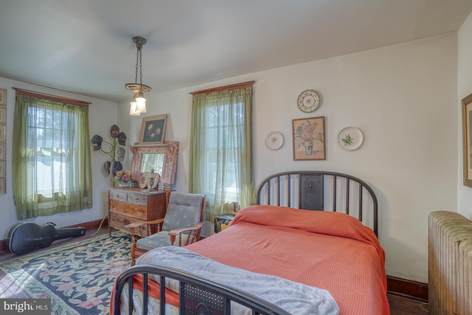 4096 Main Street Trappe, MD 21673 - Photo 55 of 70 a bedroom with a bed dresser and a window
