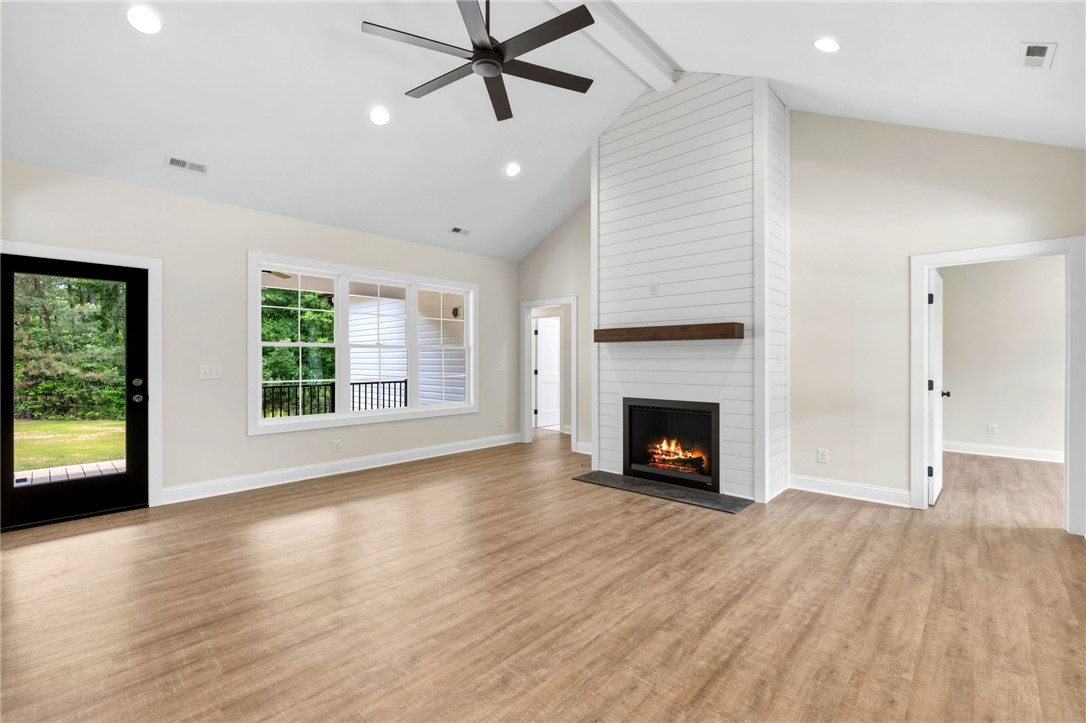 1735 Maw Bridge Road Central, SC 29630 - Photo 7 of 38 This bright living space features abundant natural light, creating an inviting atmosphere.