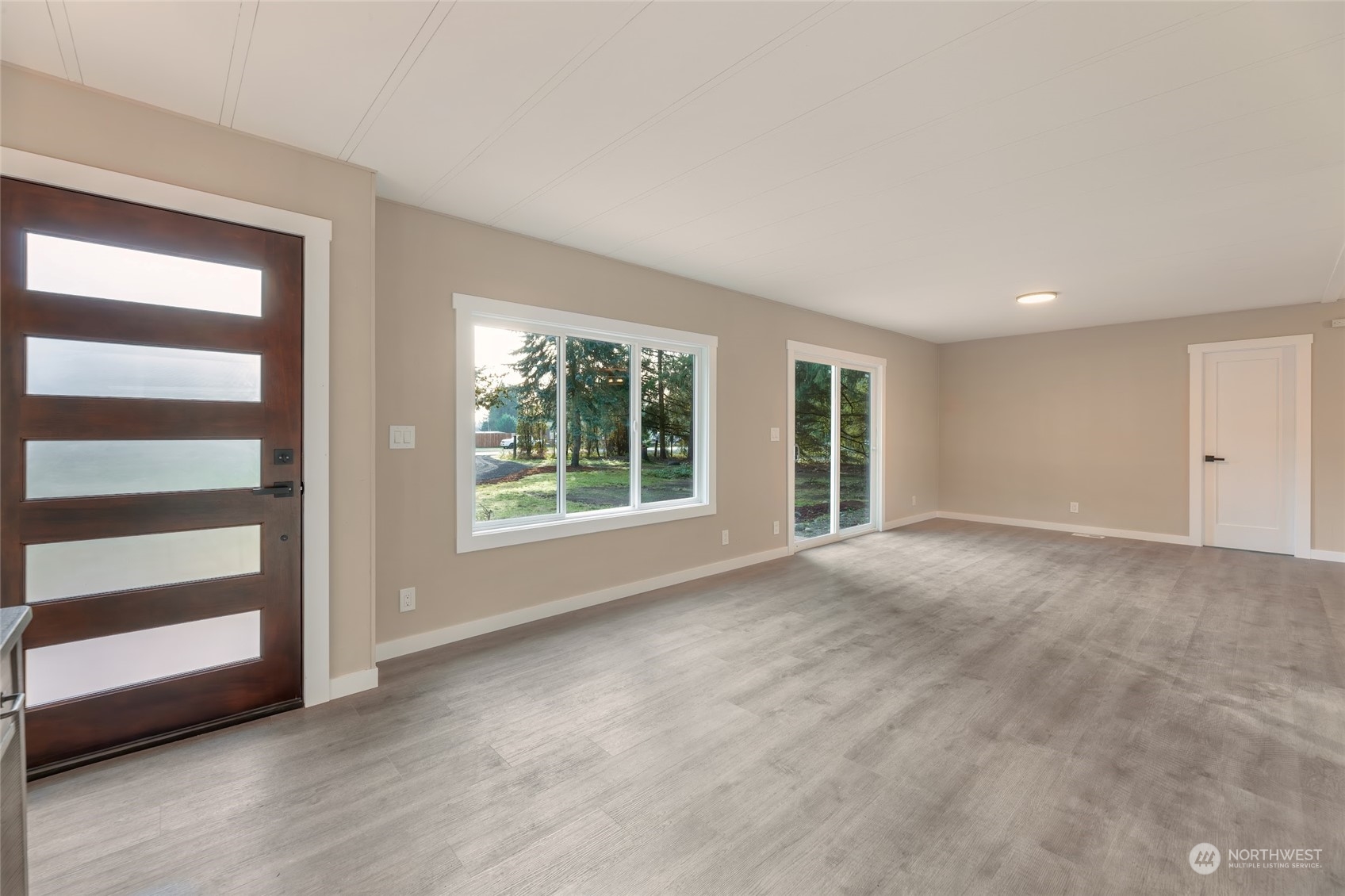 7020 187th Avenue Southwest Rochester, WA 98579 - Photo 20 of 40 a view of an empty room with a window