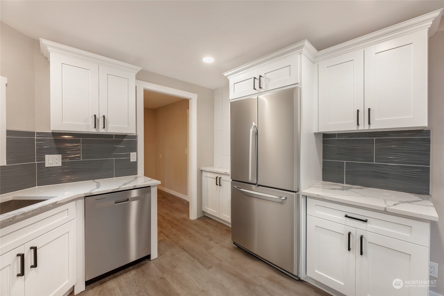7020 187th Avenue Southwest Rochester, WA 98579 - Photo 29 of 40 a kitchen with appliances cabinets and a counter space