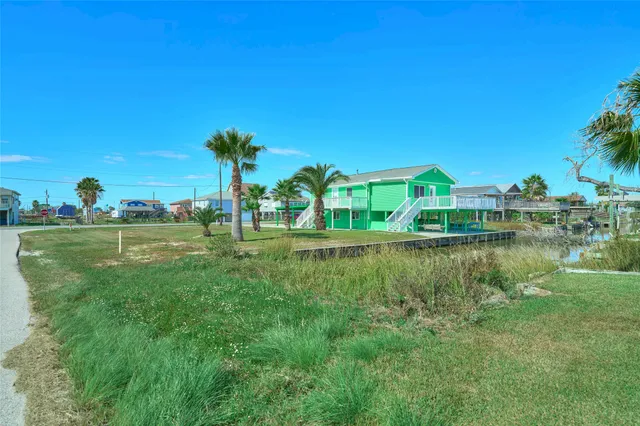 a view of a lake with a building in the background