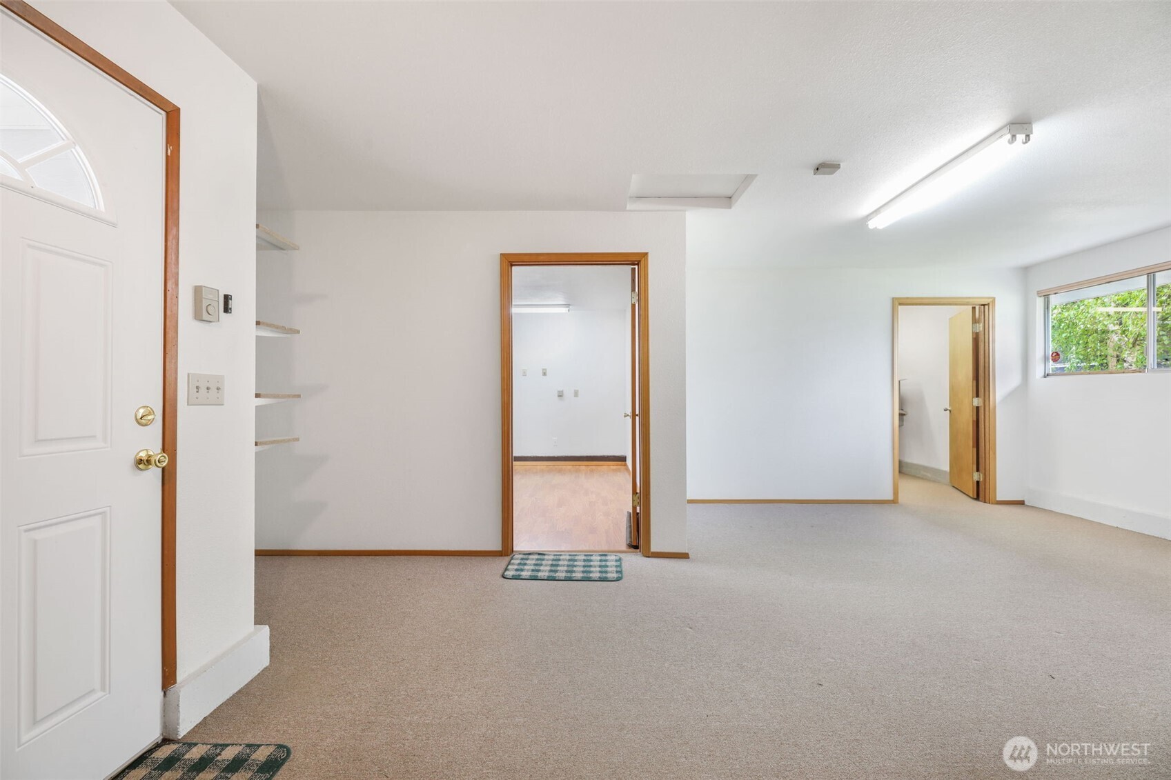 7304 Beverly Boulevard Everett, WA 98203 - Photo 24 of 38 an empty room with windows