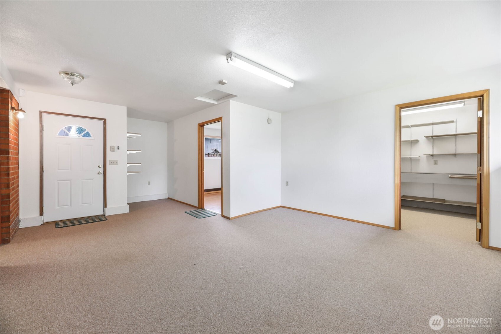 7304 Beverly Boulevard Everett, WA 98203 - Photo 25 of 38 a view of an empty room with a closet