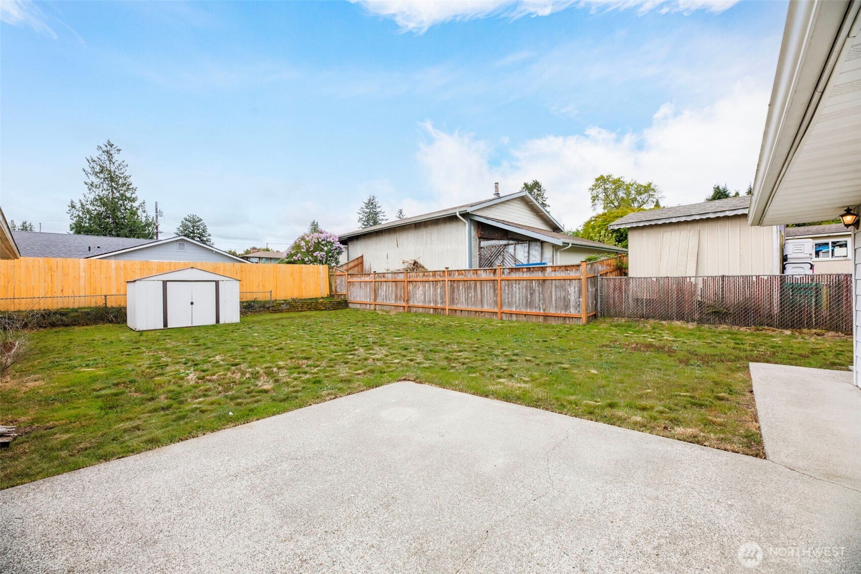 7304 Beverly Boulevard Everett, WA 98203 - Photo 33 of 38 a view of a house with a yard and sitting area
