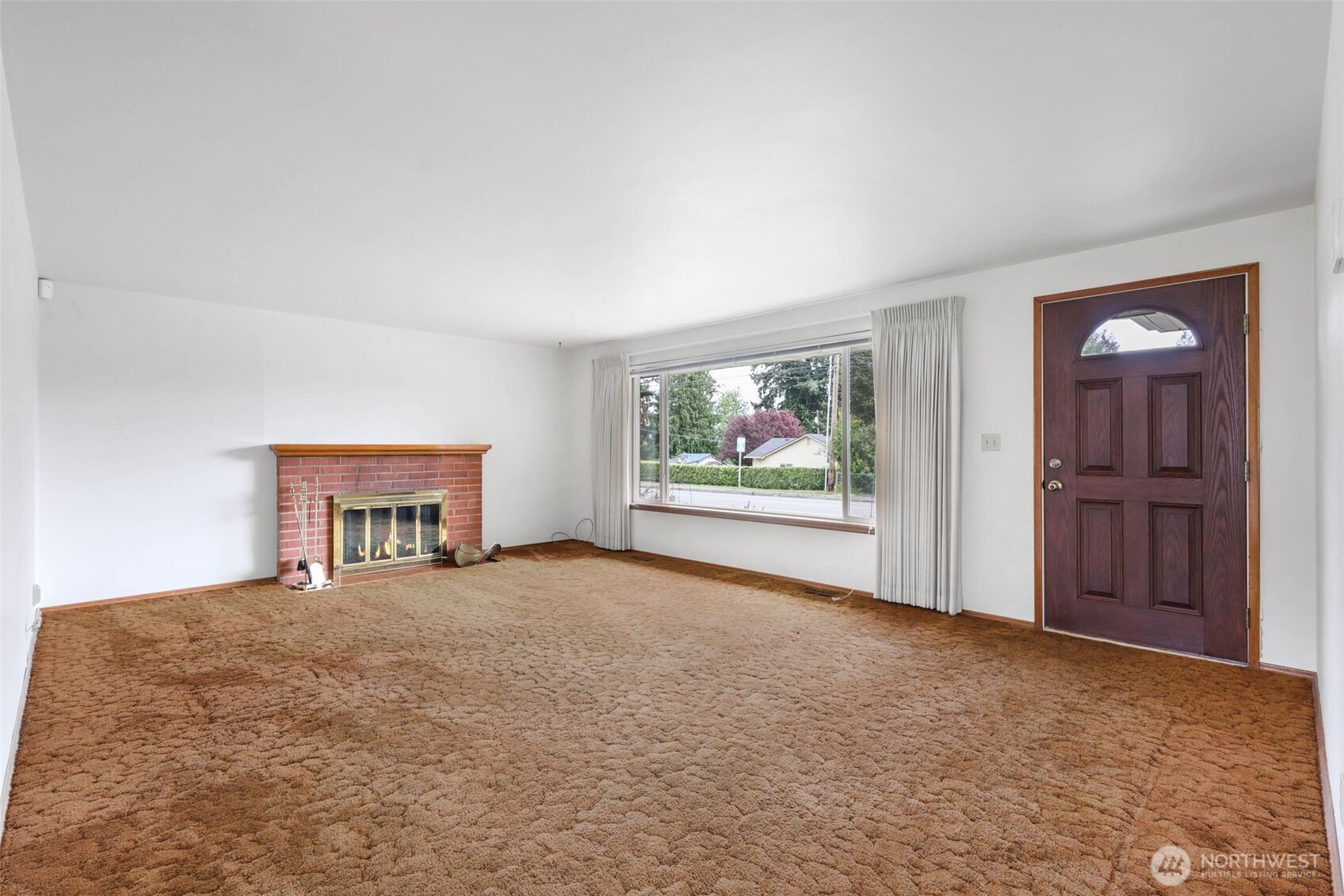 7304 Beverly Boulevard Everett, WA 98203 - Photo 10 of 38 a view of a room with window and ceiling fan