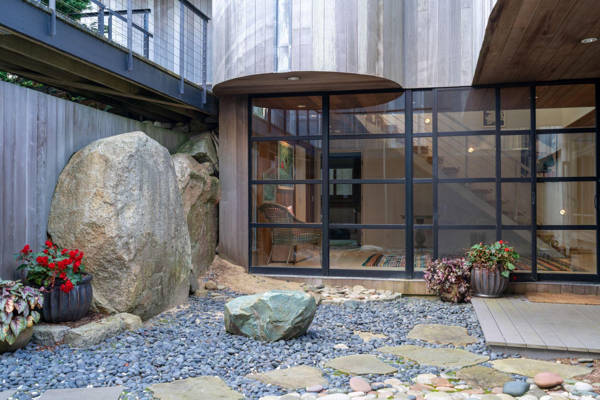6 Payomet Lane Truro, MA 02666 - Photo 14 of 52 a view of a entryway door of the house