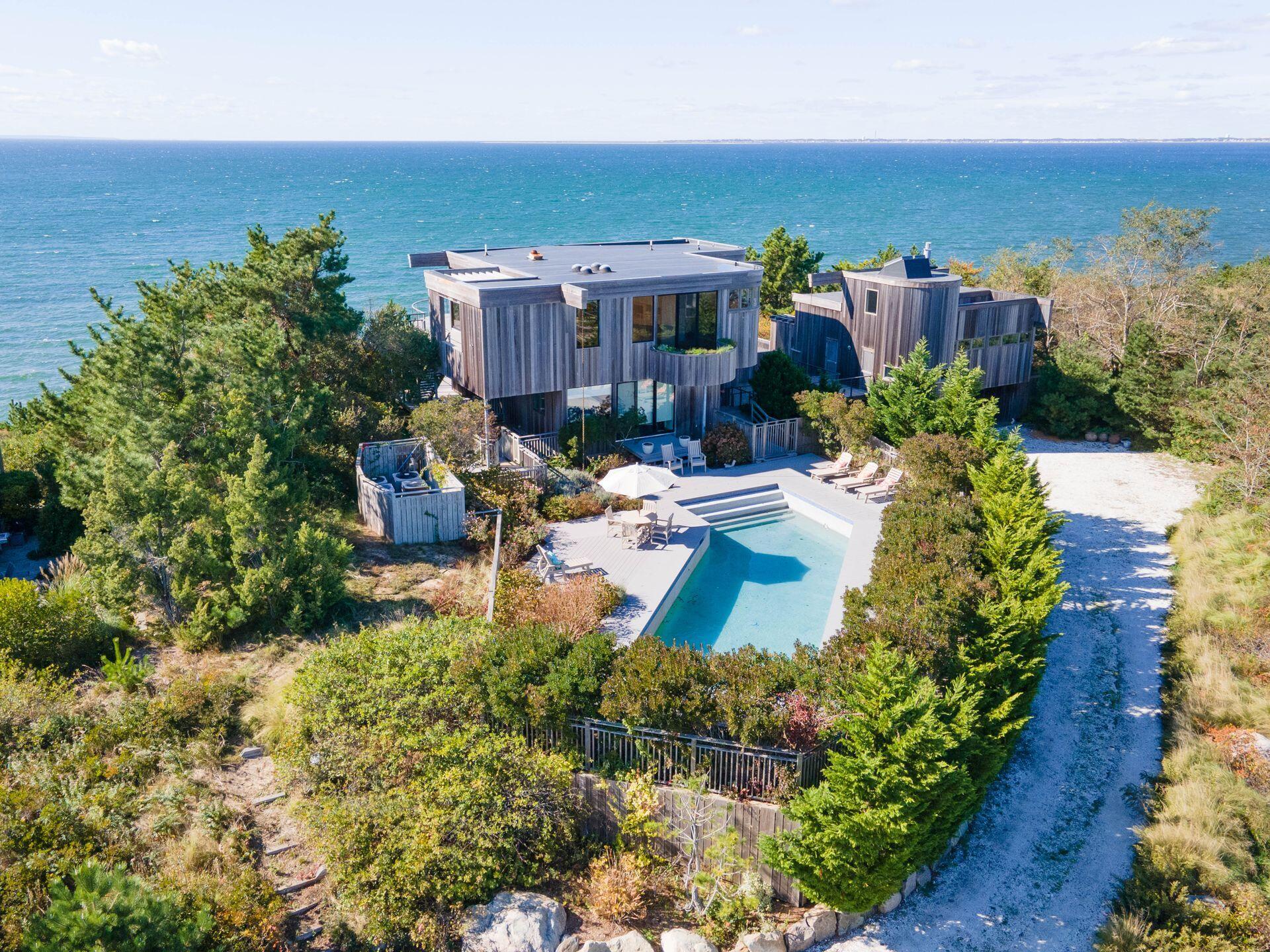 6 Payomet Lane Truro, MA 02666 - Photo 2 of 52 an aerial view of a house with a yard basket ball court and outdoor seating
