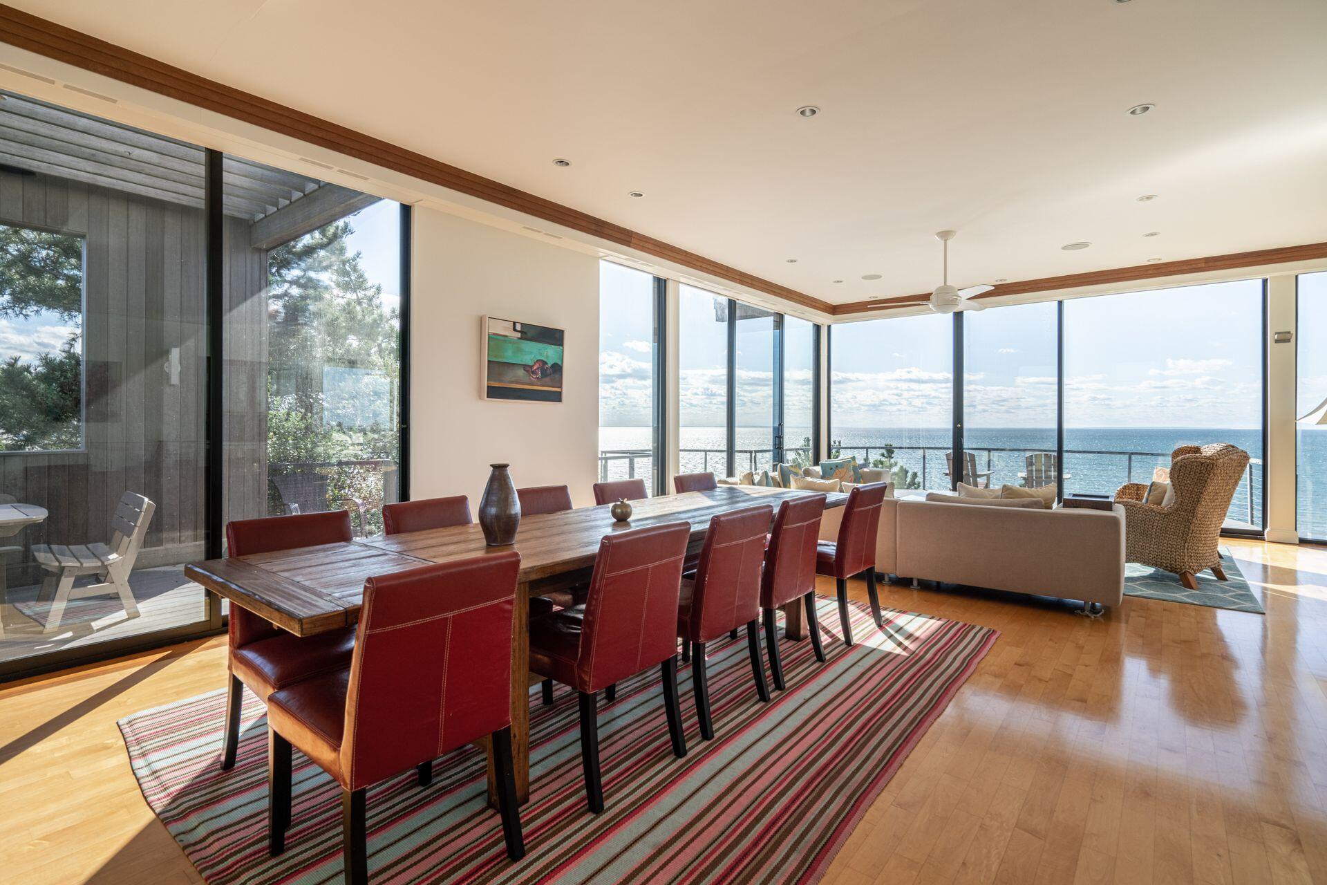 6 Payomet Lane Truro, MA 02666 - Photo 22 of 52 a view of a dining room with furniture window and wooden floor