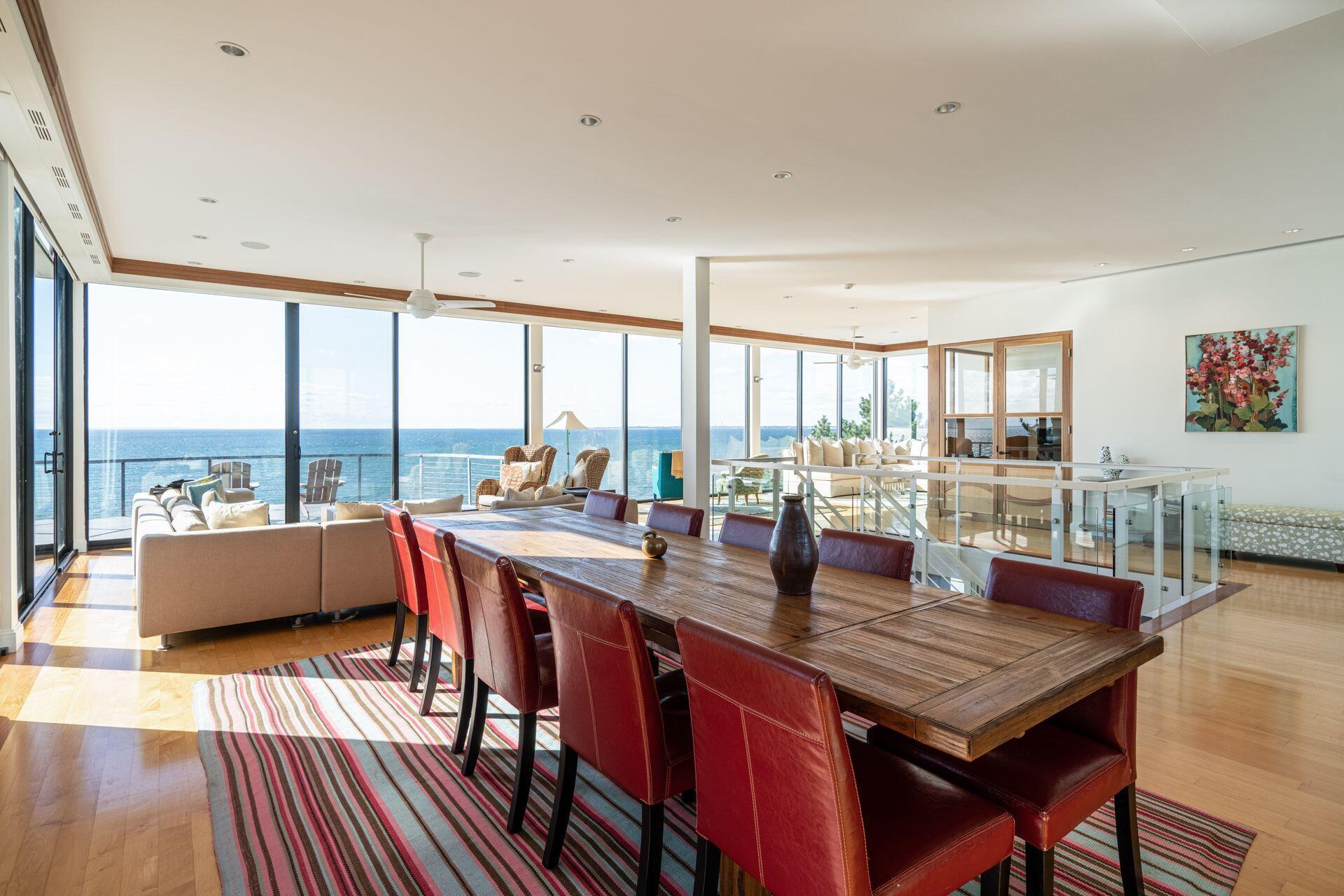 6 Payomet Lane Truro, MA 02666 - Photo 23 of 52 a view of a dining room with furniture window and wooden floor