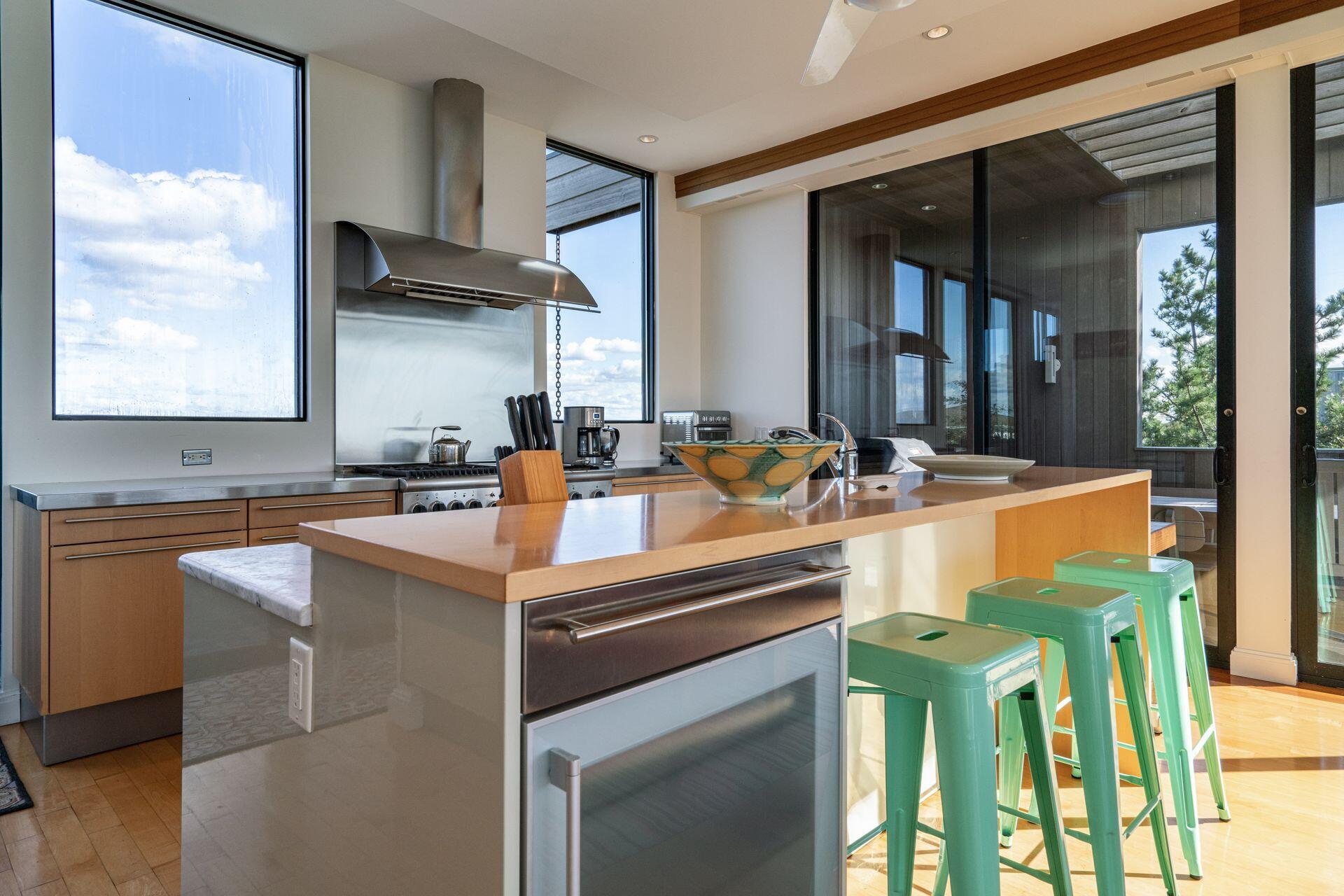 6 Payomet Lane Truro, MA 02666 - Photo 25 of 52 a kitchen that has a sink and a stove in it