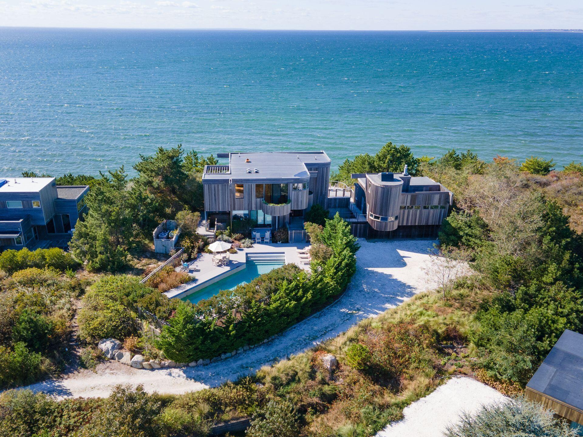 6 Payomet Lane Truro, MA 02666 - Photo 3 of 52 an aerial view of a house with a garden