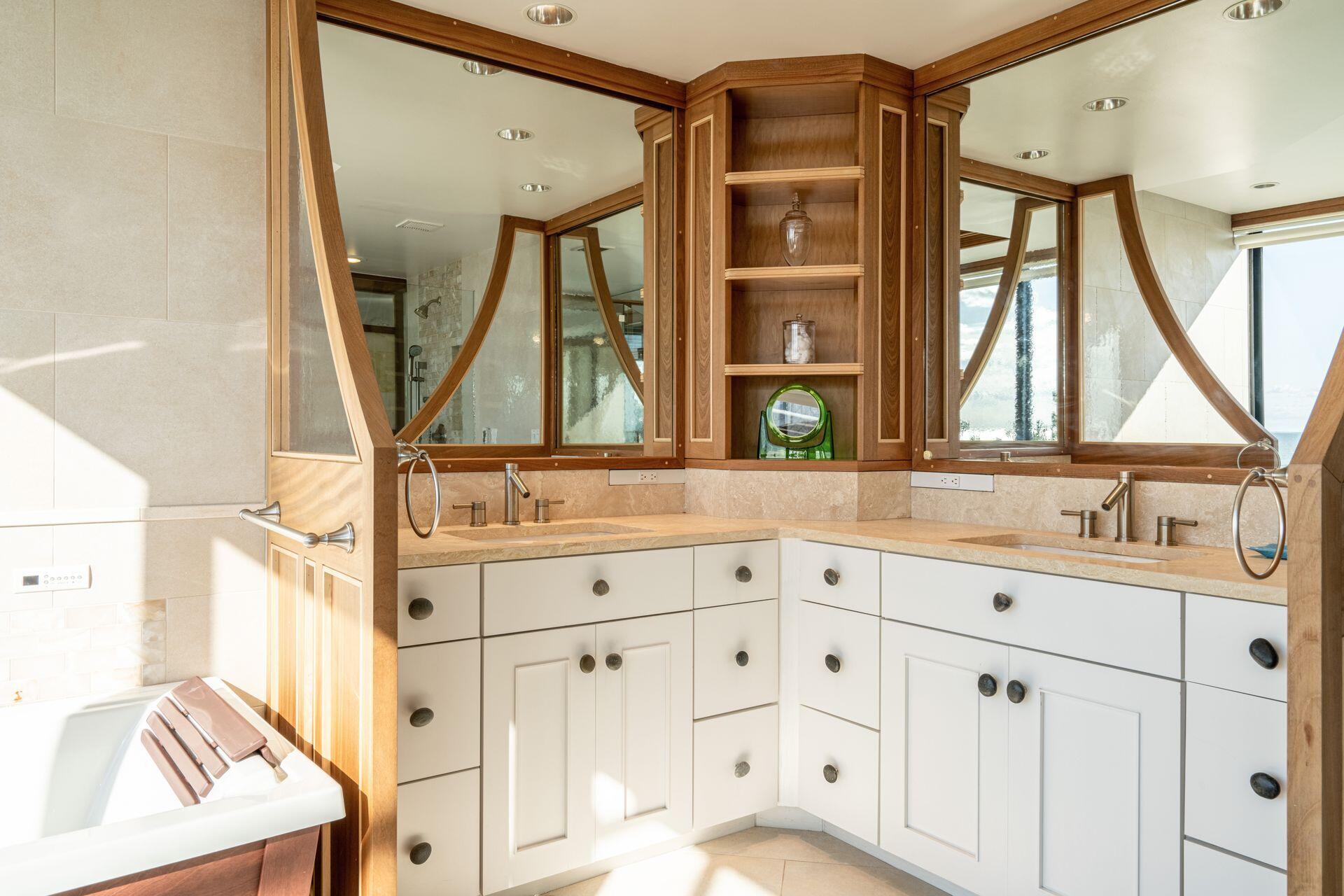 6 Payomet Lane Truro, MA 02666 - Photo 36 of 52 a bathroom with a sink a vanity and a mirror
