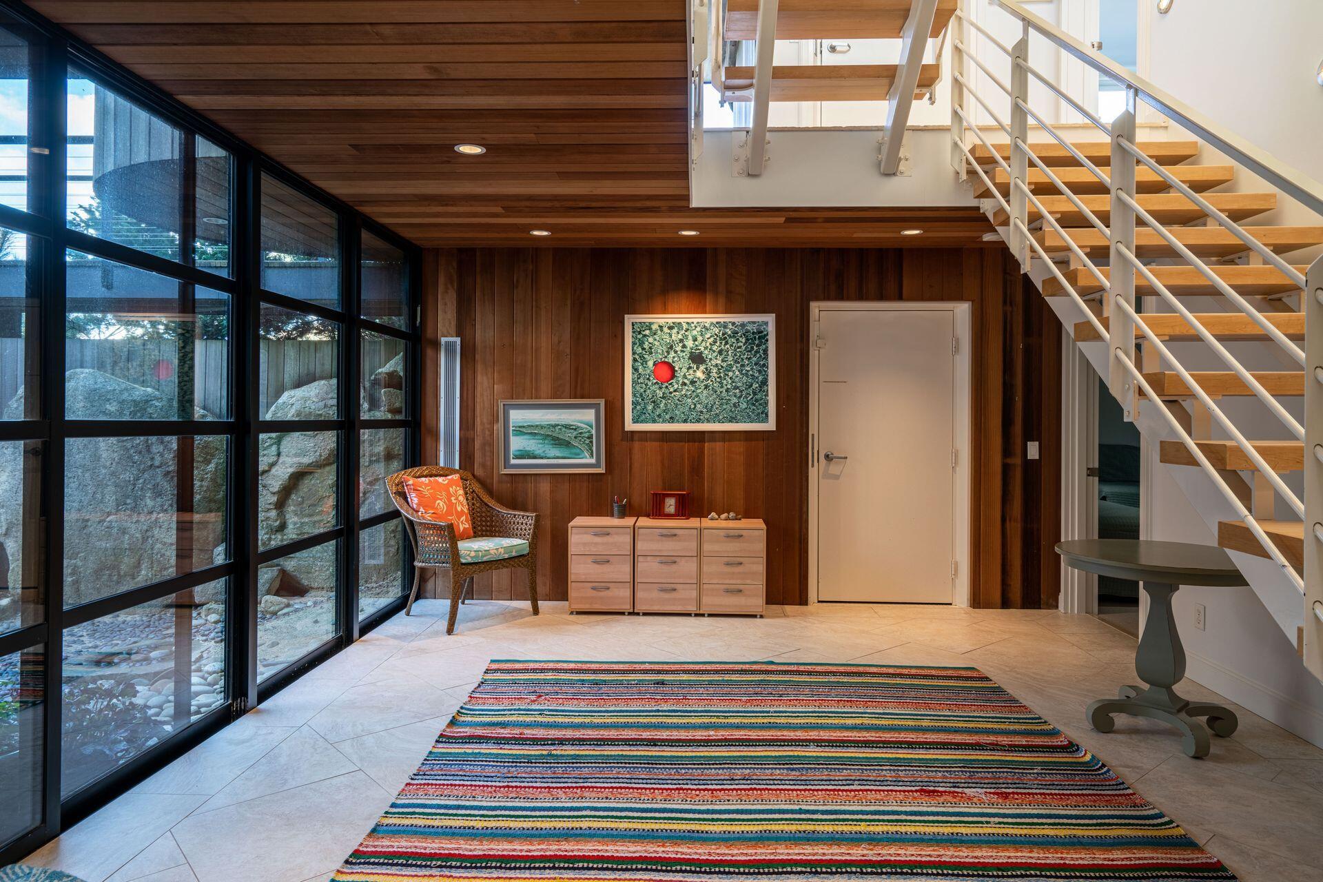 6 Payomet Lane Truro, MA 02666 - Photo 40 of 52 a bedroom with furniture and a rug