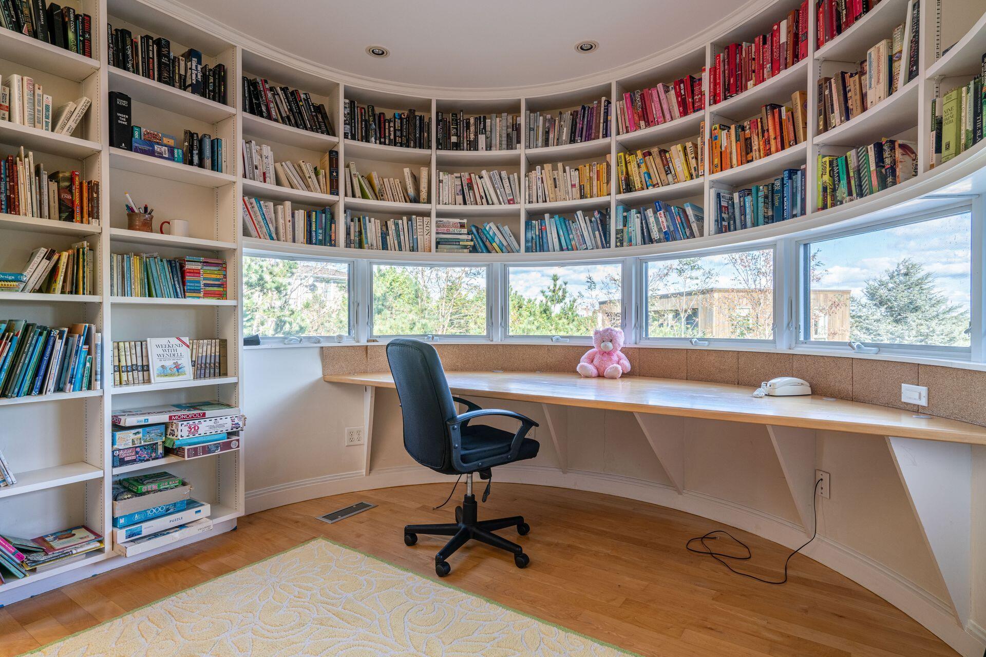 6 Payomet Lane Truro, MA 02666 - Photo 45 of 52 a view of a workspace with a bookshelf