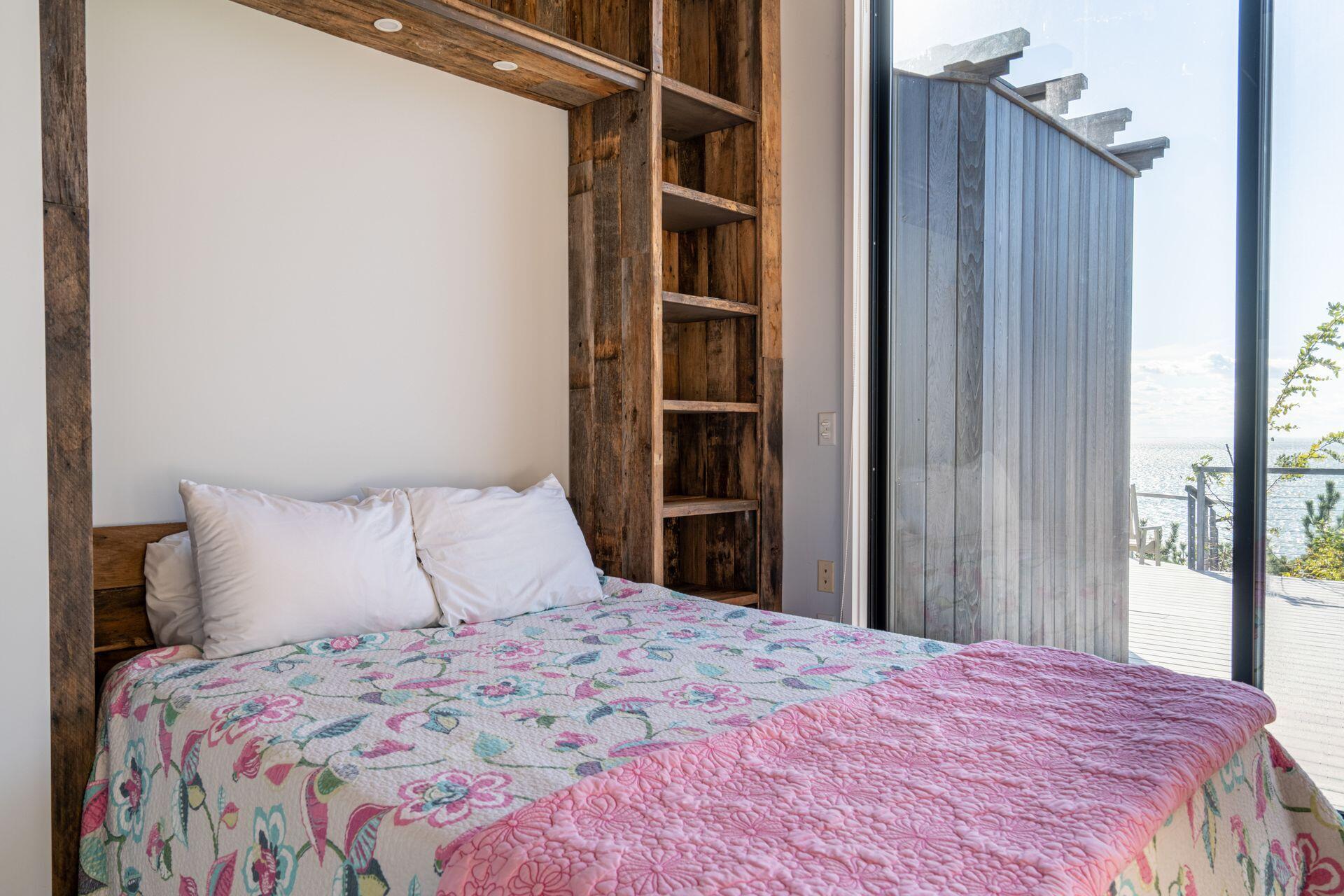 6 Payomet Lane Truro, MA 02666 - Photo 47 of 52 a bedroom with a bed and a window