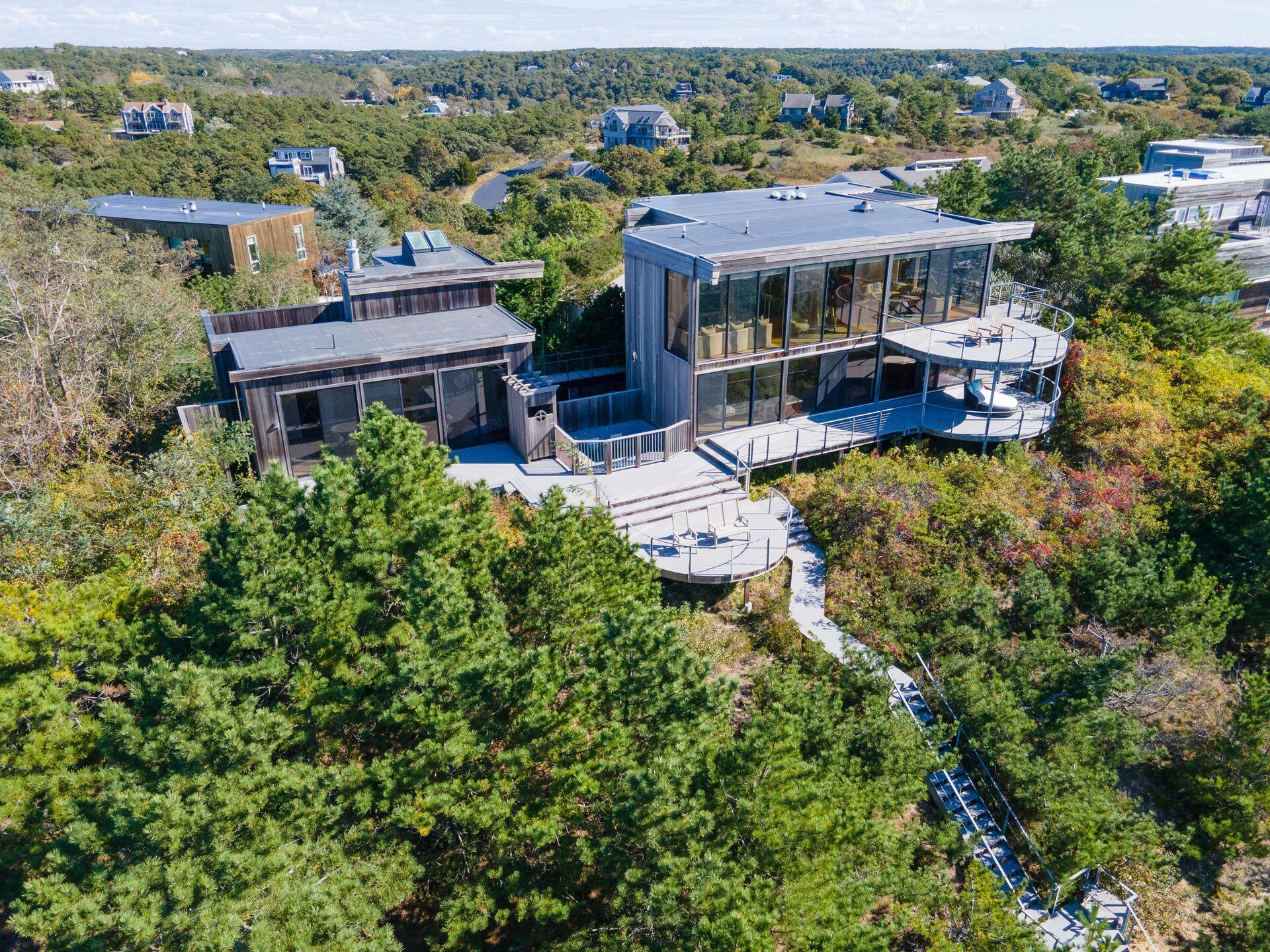 6 Payomet Lane Truro, MA 02666 - Photo 7 of 52 an aerial view of a house with a garden lake view