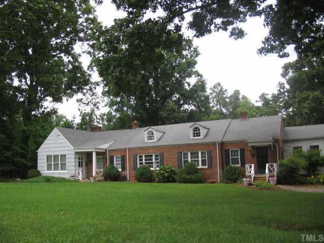3046 Farrior Road Raleigh, NC 27607 - Photo 1 of 10 a front view of a house with a garden