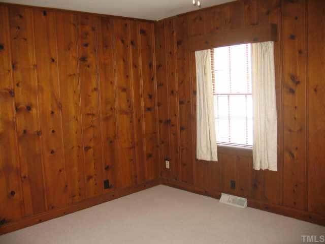 3046 Farrior Road Raleigh, NC 27607 - Photo 7 of 10 a view of an empty room and window