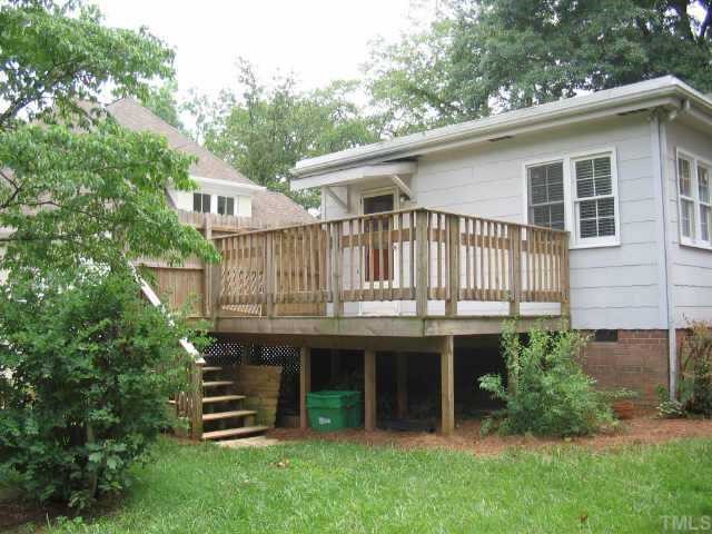 3046 Farrior Road Raleigh, NC 27607 - Photo 9 of 10 a view of a house with a backyard and deck