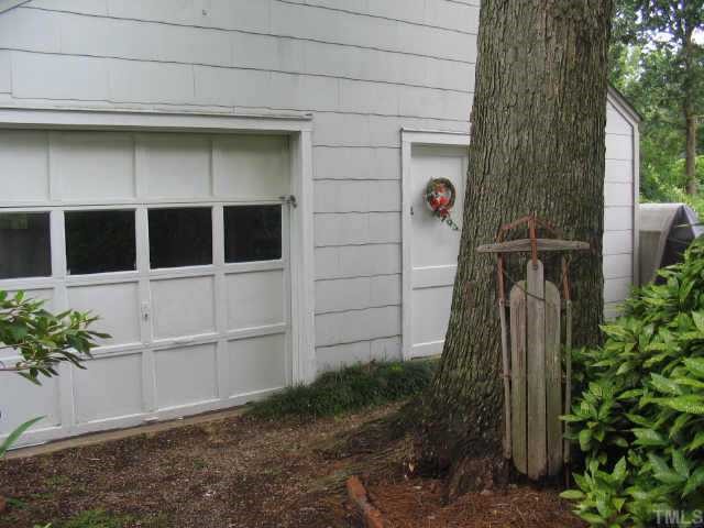 3046 Farrior Road Raleigh, NC 27607 - Photo 10 of 10 a view of front door and potted plants