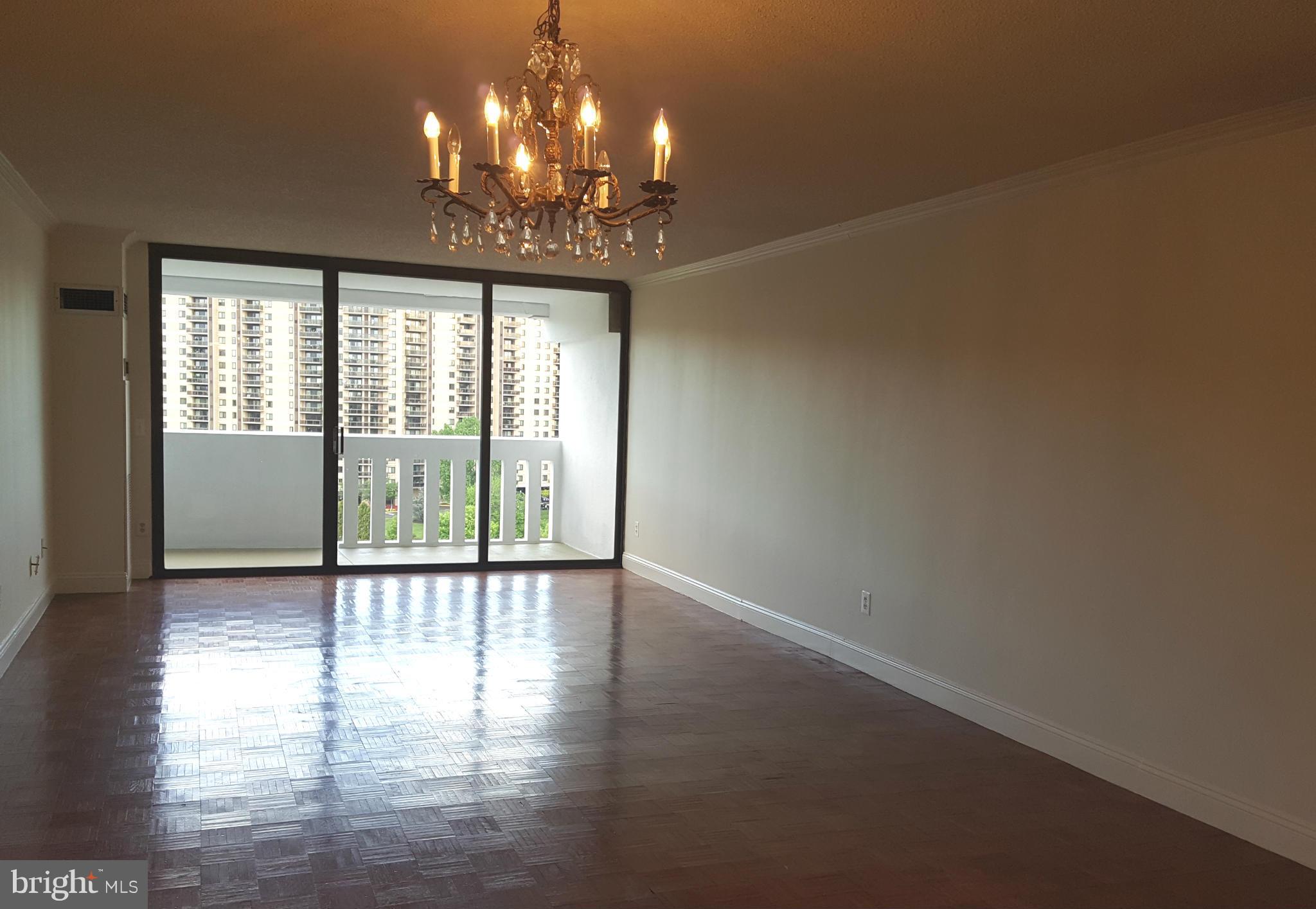 6101 Edsall Road, Unit 1506 Alexandria, VA 22304 - Photo 11 of 26 a view of a livingroom with a window