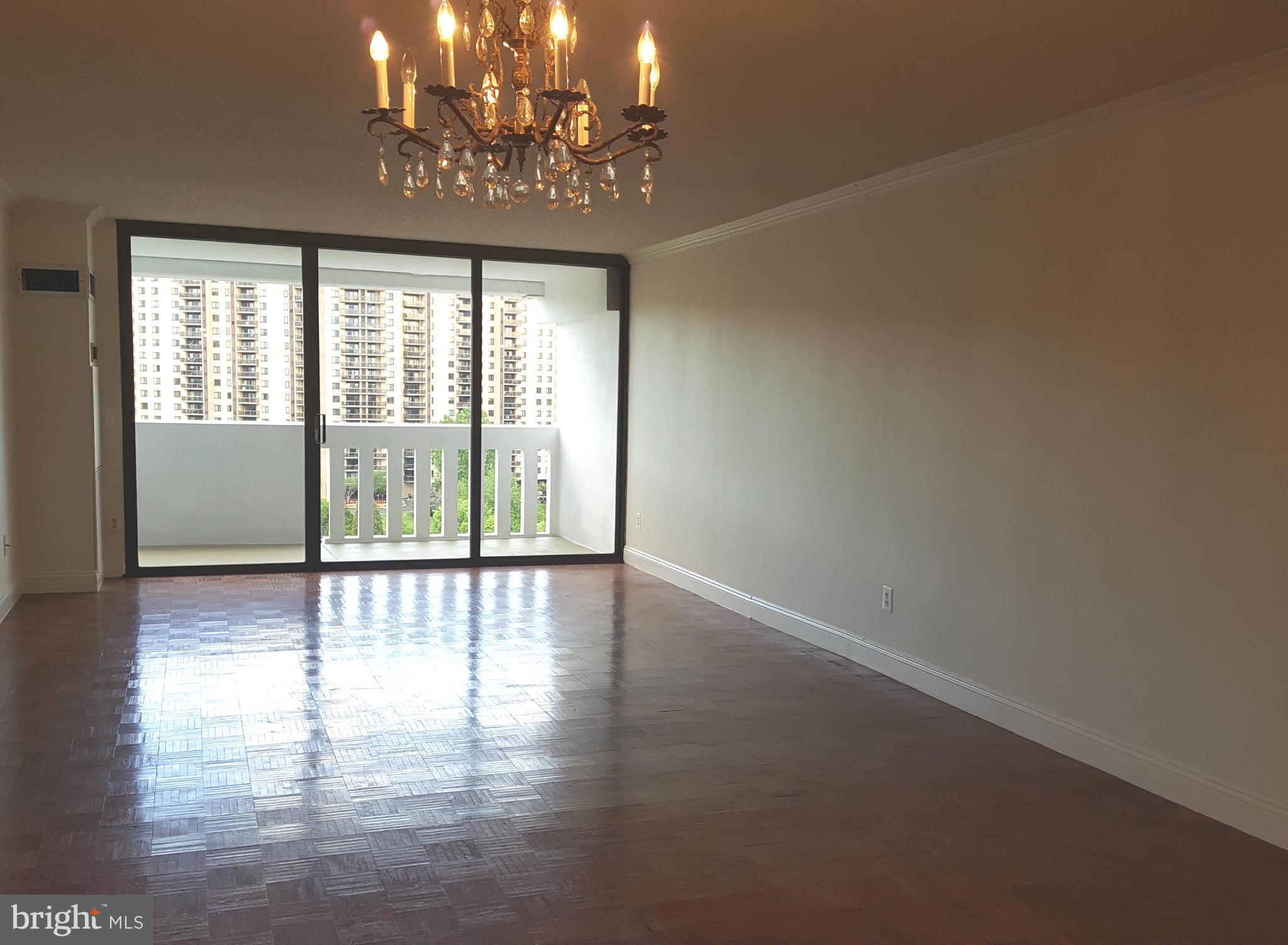 6101 Edsall Road, Unit 1506 Alexandria, VA 22304 - Photo 13 of 26 a view of a livingroom with a hard wood floor