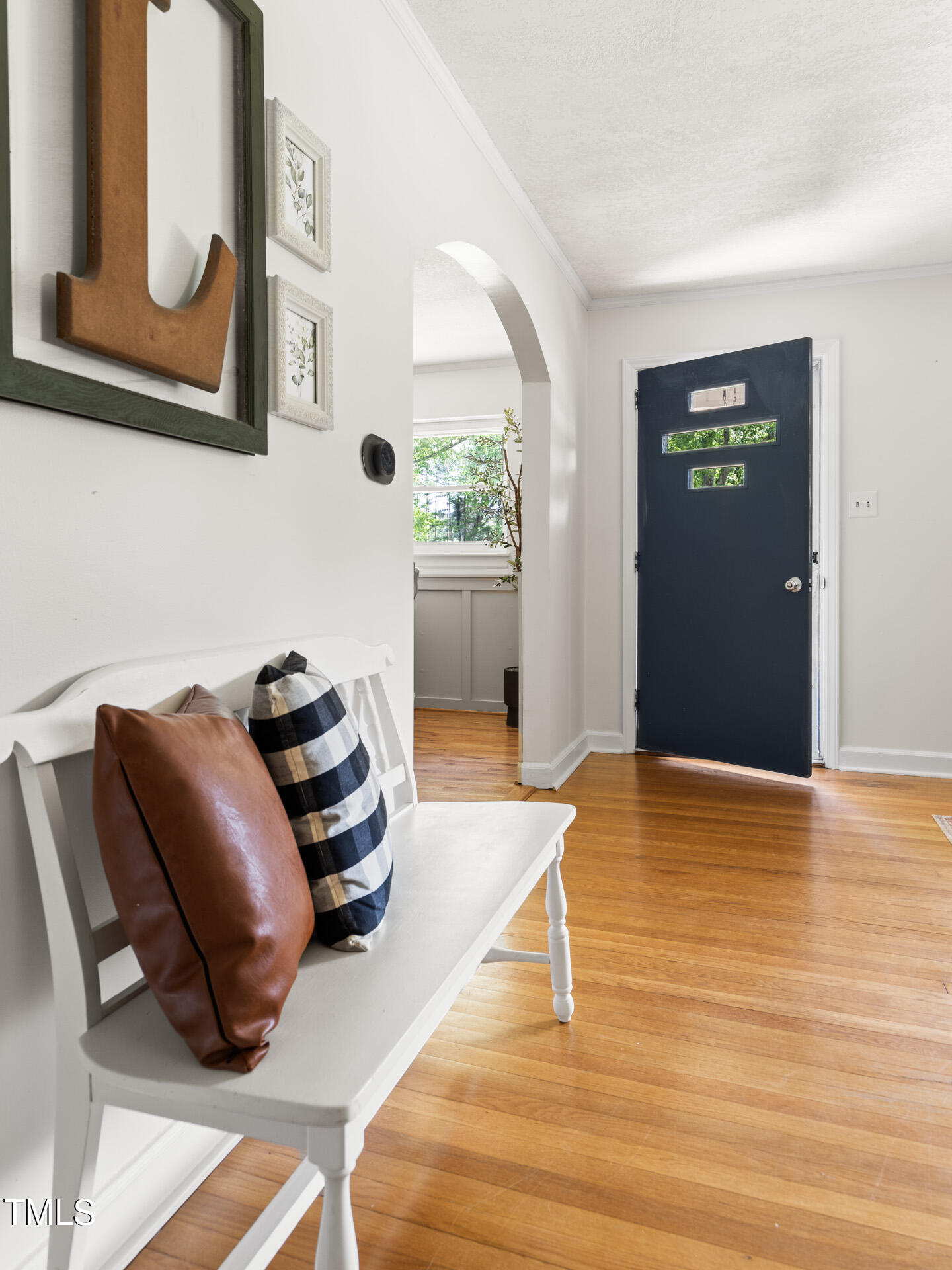 2702 Richwood Road Durham, NC 27705 - Photo 15 of 47 a room with wooden floor and furniture