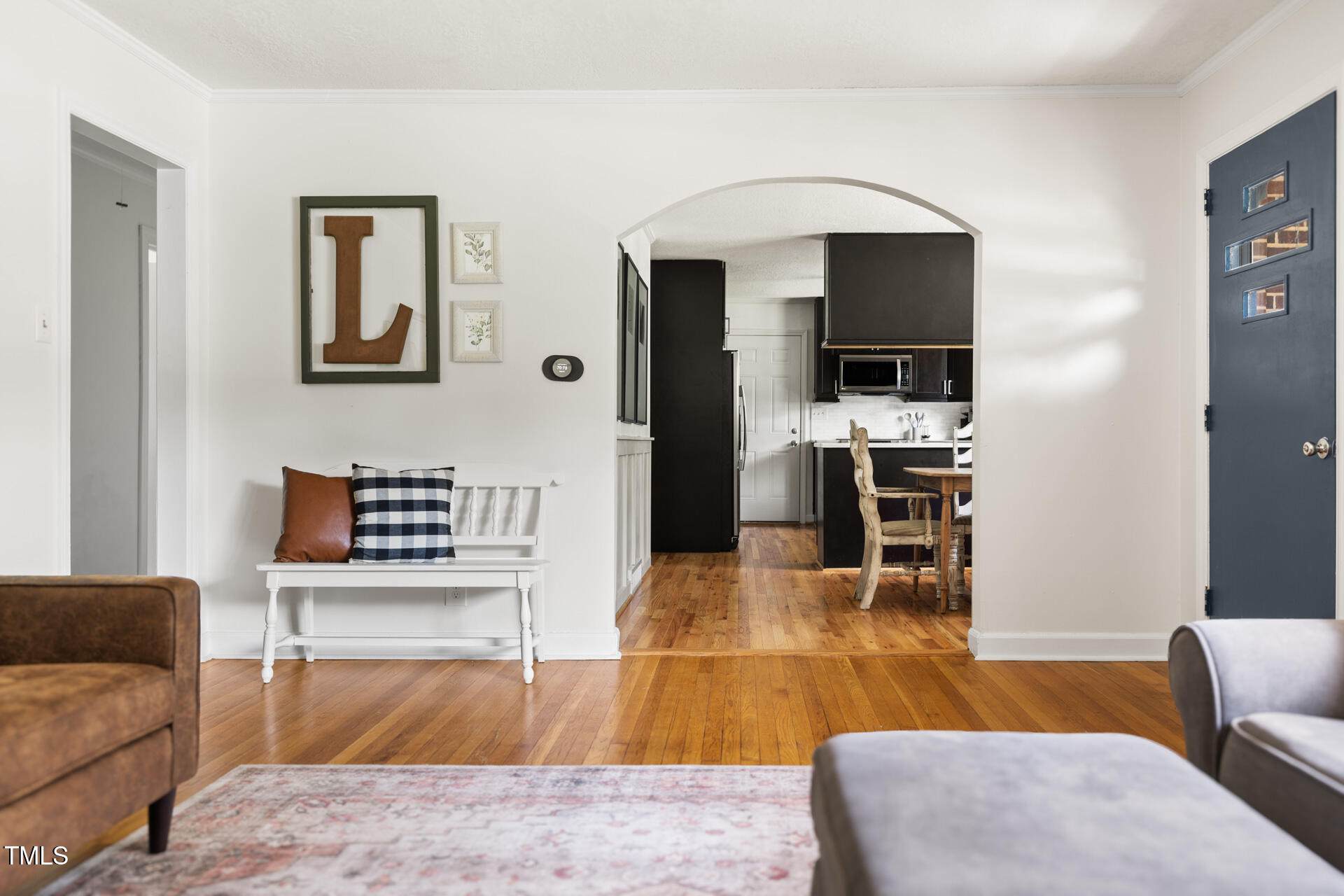 2702 Richwood Road Durham, NC 27705 - Photo 17 of 47 a living room with furniture and a flat screen tv