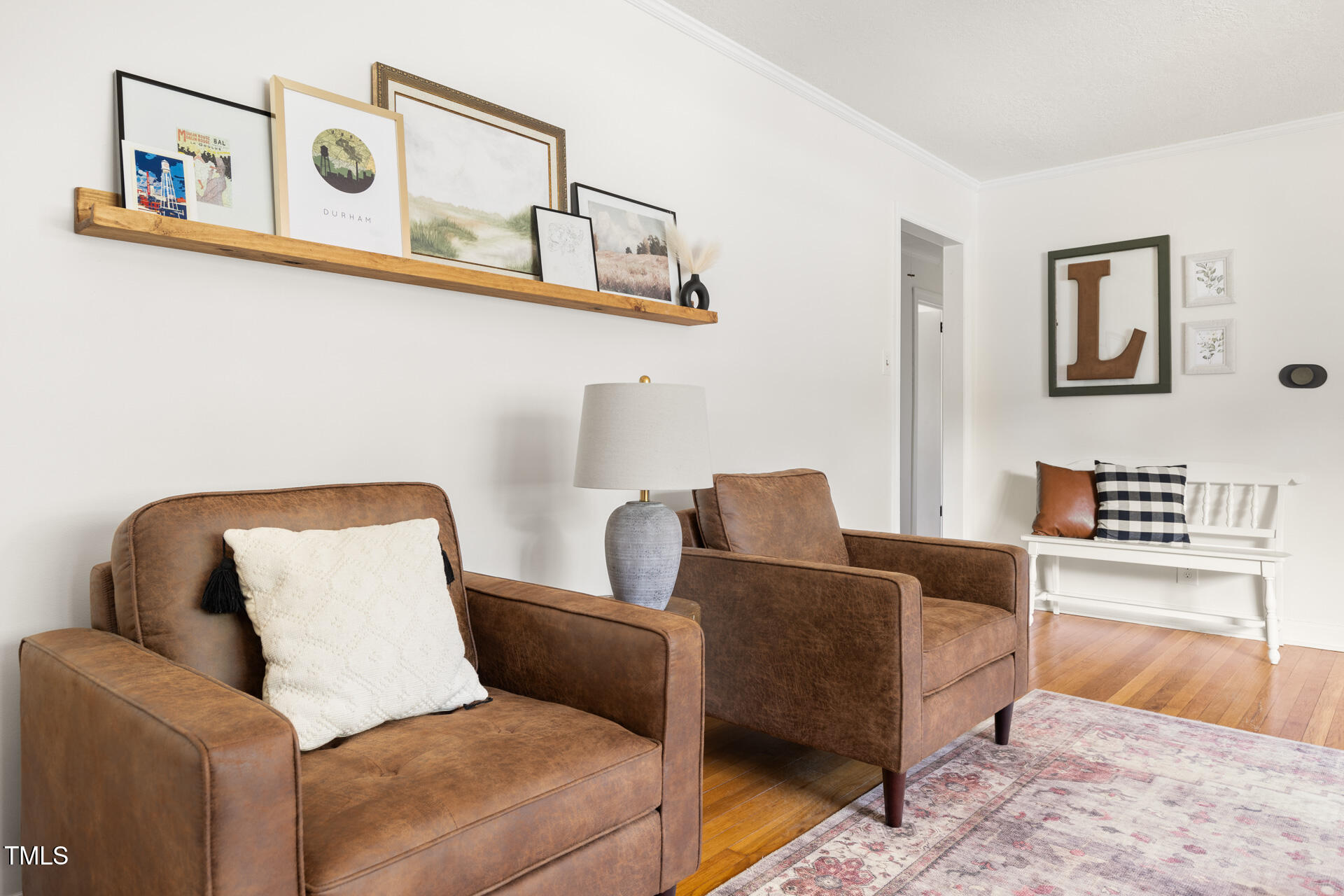 2702 Richwood Road Durham, NC 27705 - Photo 18 of 47 a living room with furniture and a couch