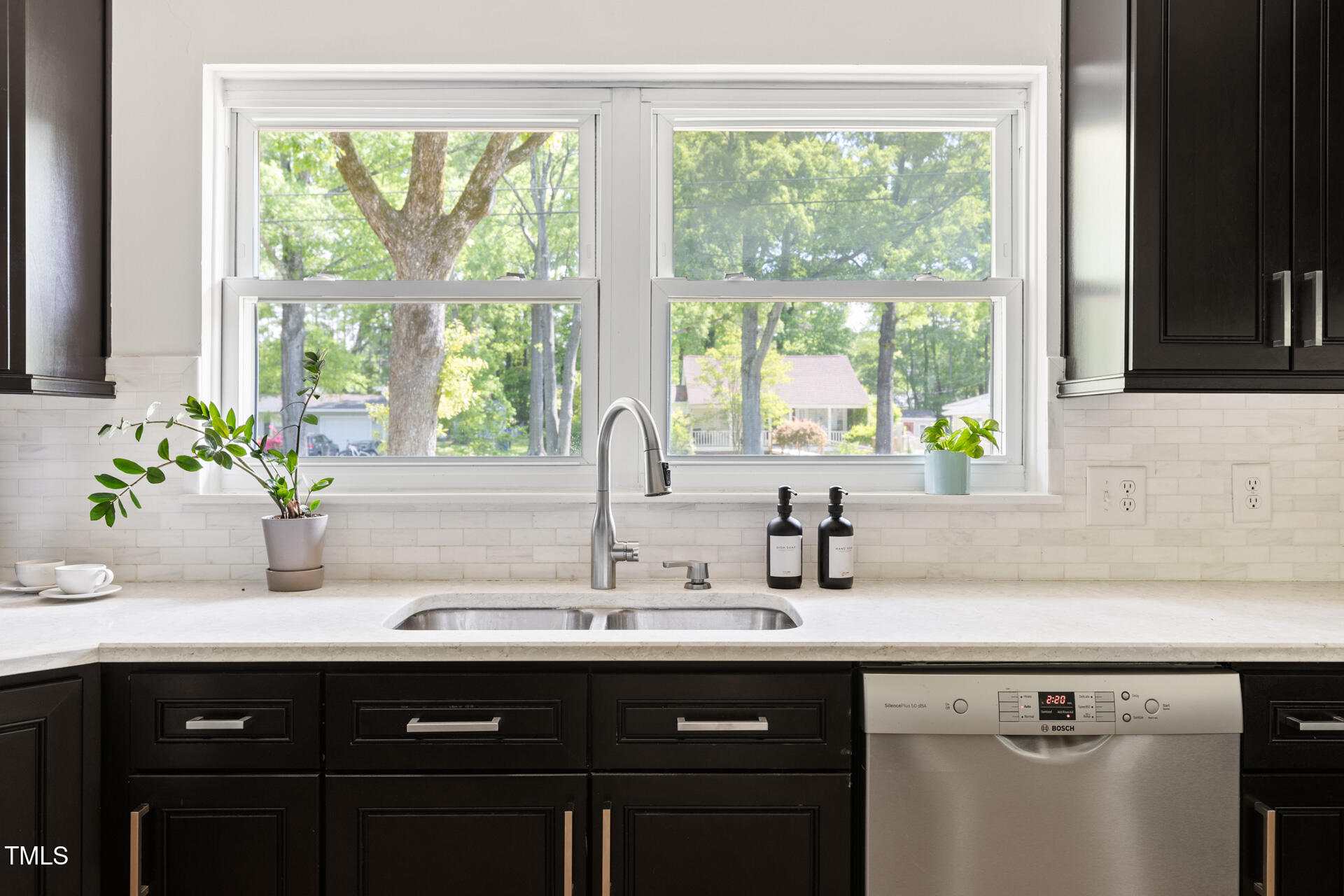 2702 Richwood Road Durham, NC 27705 - Photo 24 of 47 a kitchen with a sink and a window