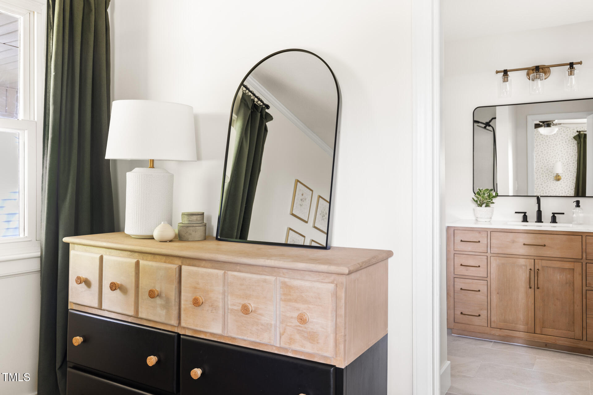 2702 Richwood Road Durham, NC 27705 - Photo 31 of 47 a bathroom with a sink a mirror and a toilet