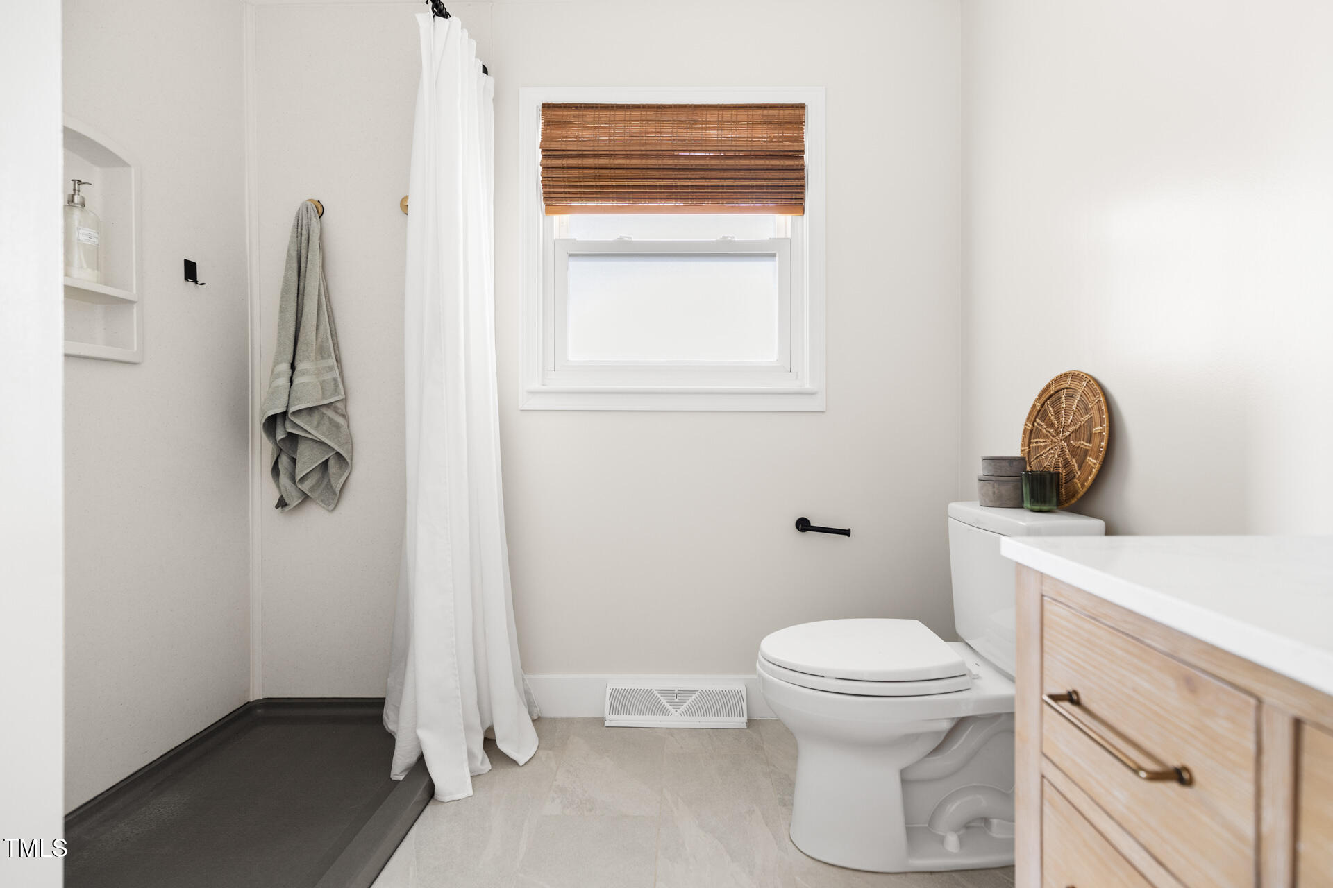 2702 Richwood Road Durham, NC 27705 - Photo 34 of 47 a bathroom with a toilet and a sink
