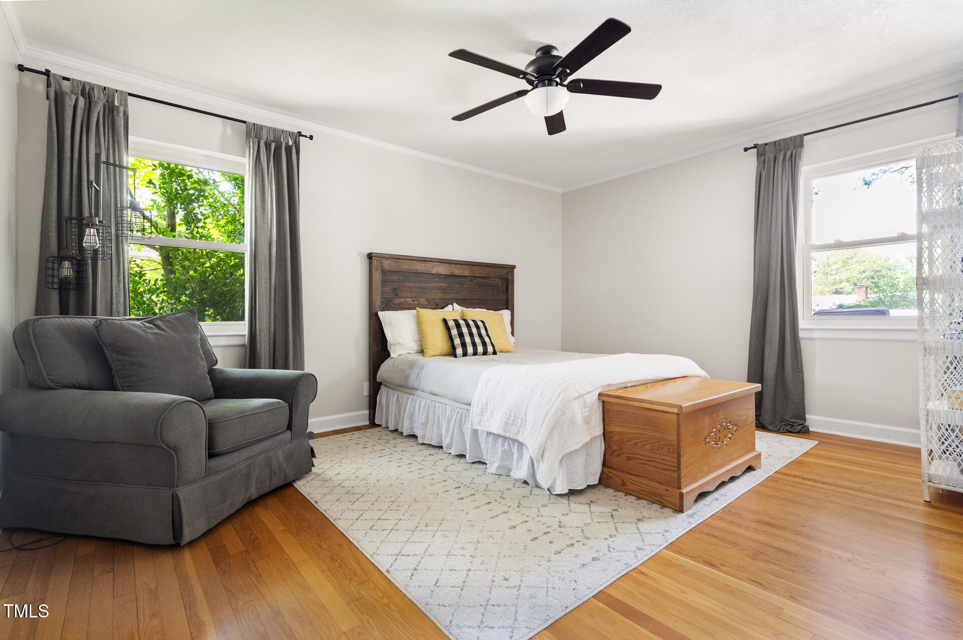 2702 Richwood Road Durham, NC 27705 - Photo 37 of 47 a spacious bedroom with a bed couch and a window