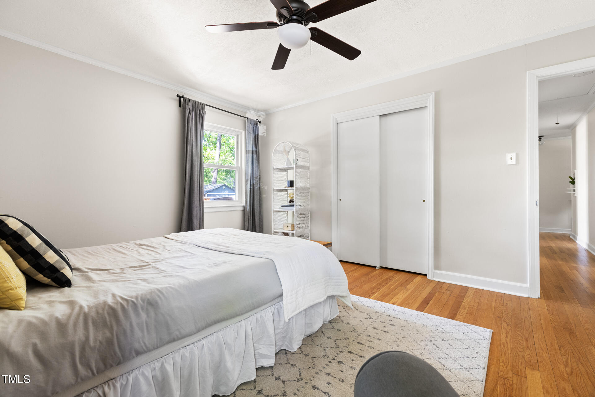 2702 Richwood Road Durham, NC 27705 - Photo 38 of 47 a bedroom with a bed and wooden floor