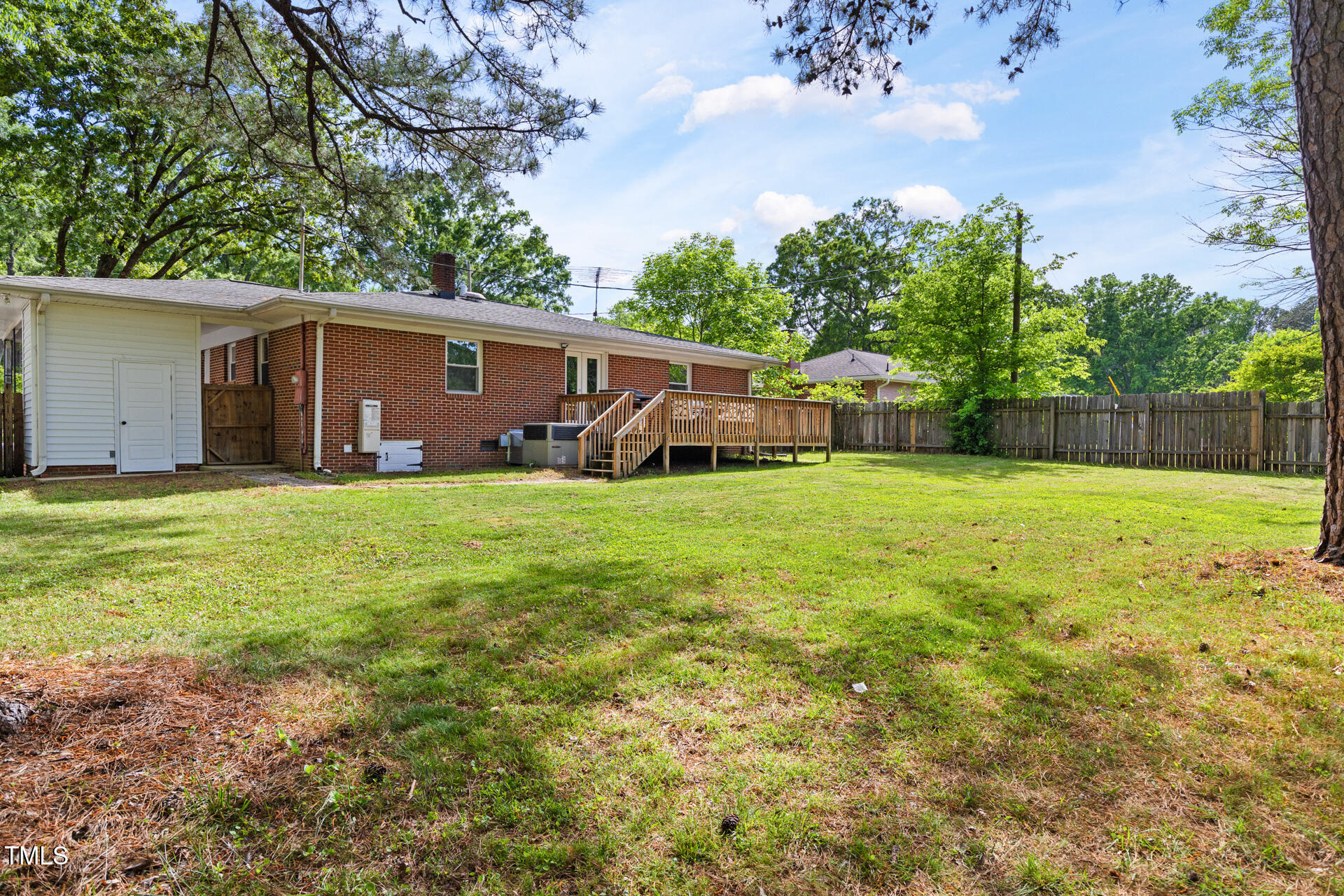 2702 Richwood Road Durham, NC 27705 - Photo 46 of 47 a view of a house with a yard and trees