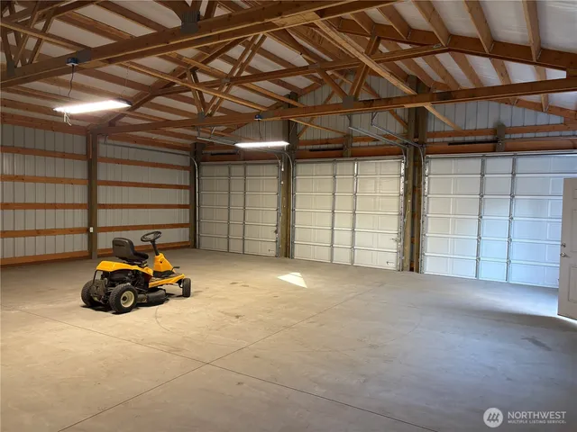 a view of parking garage with empty racks
