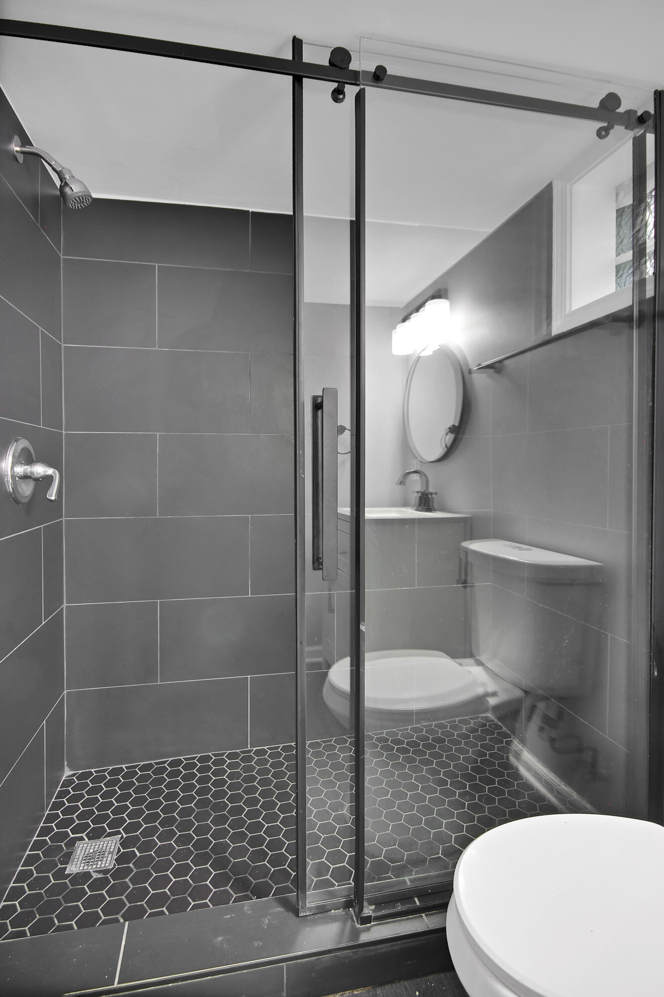 836 Fayette Street Gary, IN 46403 - Photo 7 of 16 a bathroom with a toilet and a shower