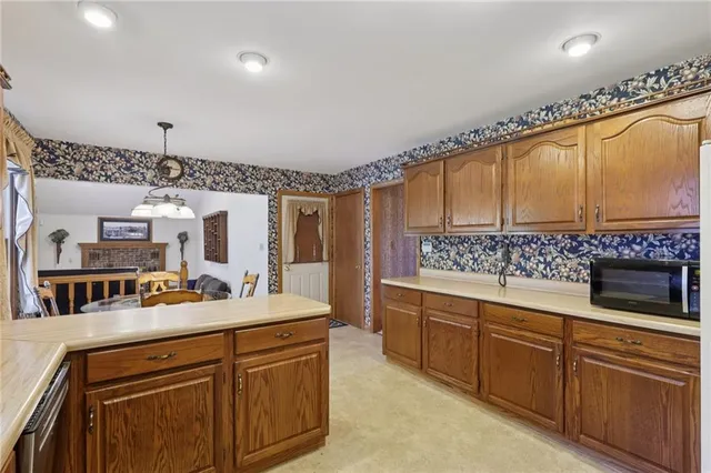 a bathroom with a sink a mirror and a shower