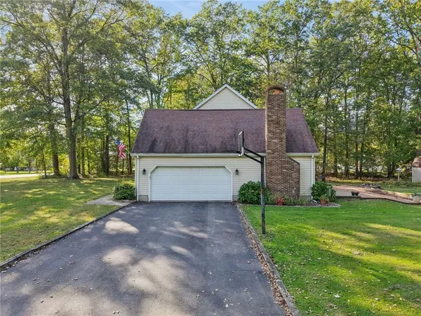 a house view with a garden space