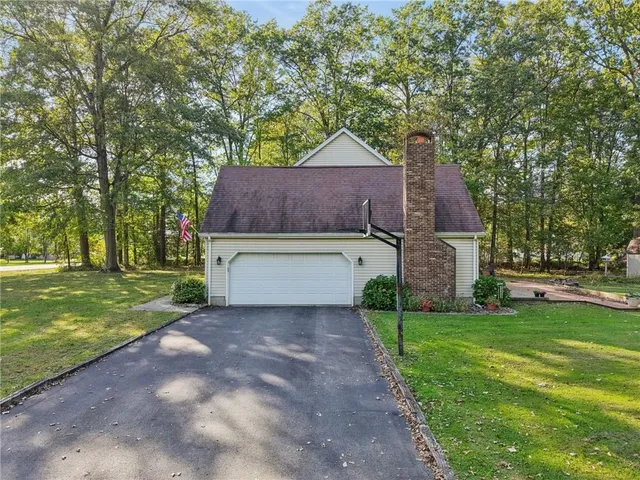 a house view with a garden space