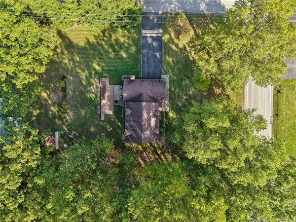 a view of a house with a tree