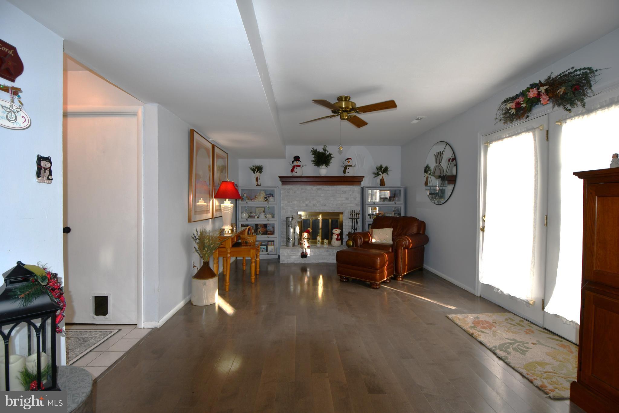 1434 Woodview Road Yardley, PA 19067 - Photo 17 of 37 Family room with wood fireplace