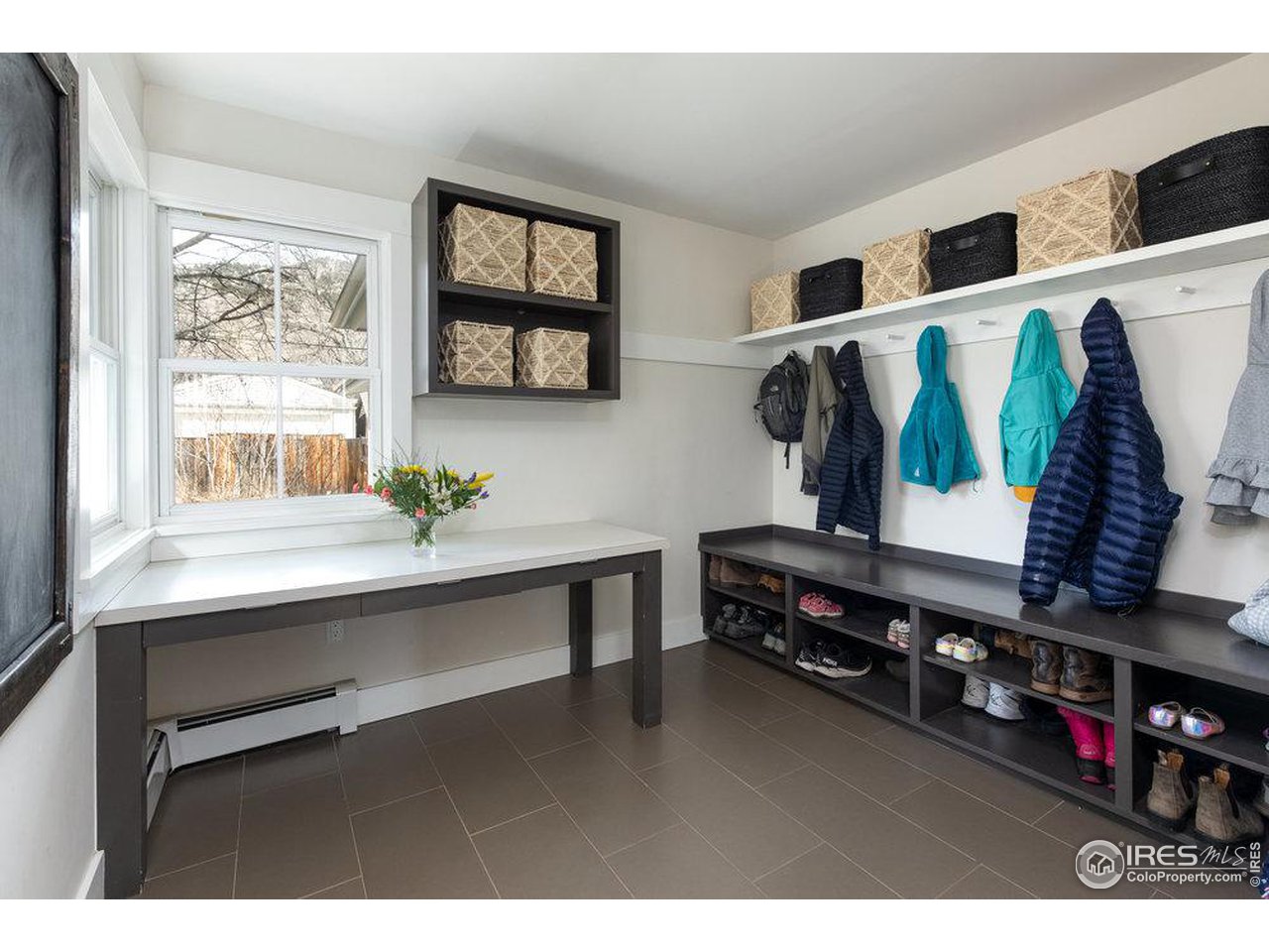 3221 8th Street Boulder, CO 80304 - Photo 15 of 40 a living room with furniture and a window