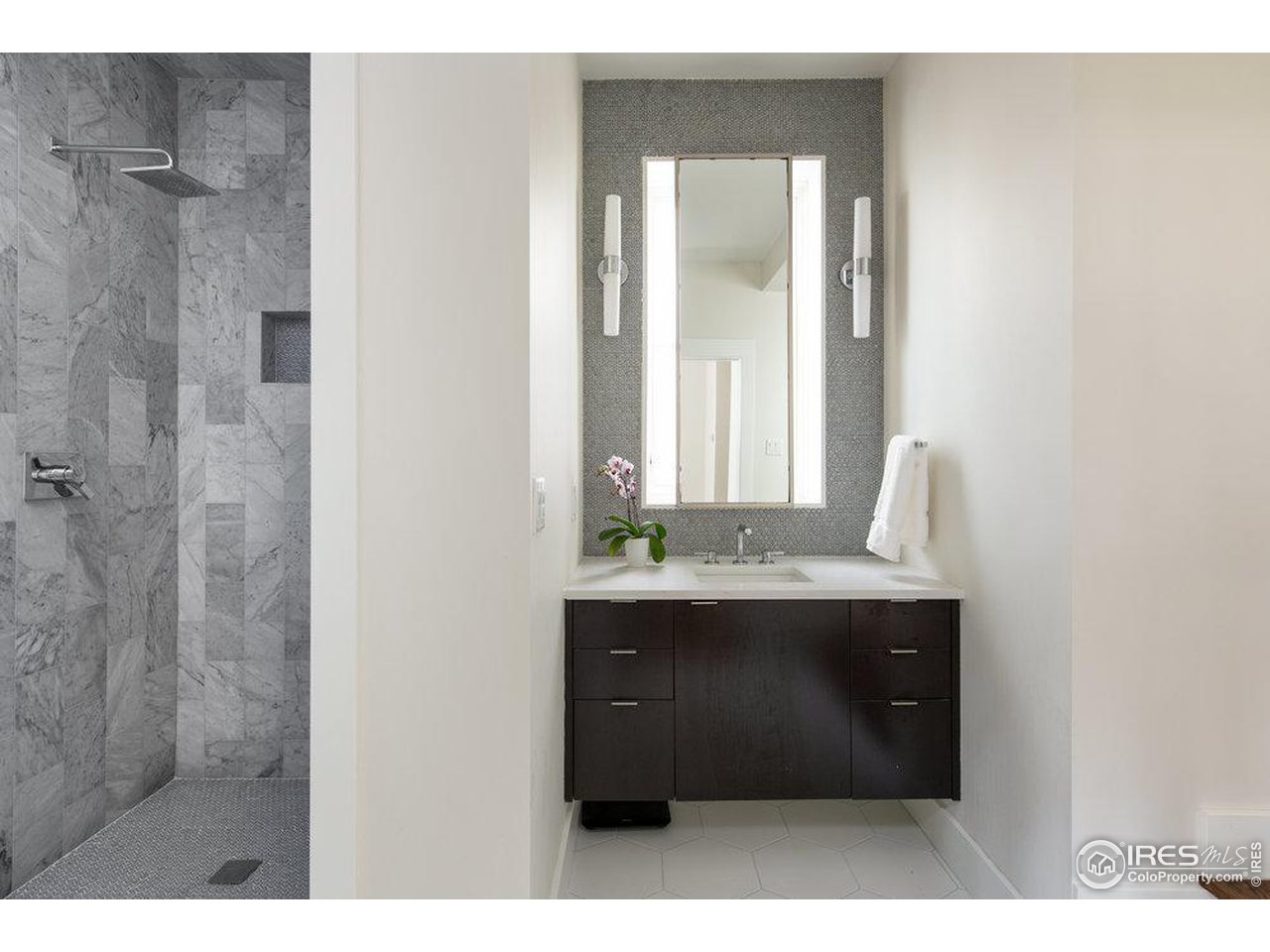 3221 8th Street Boulder, CO 80304 - Photo 23 of 40 a bathroom with a sink and mirror