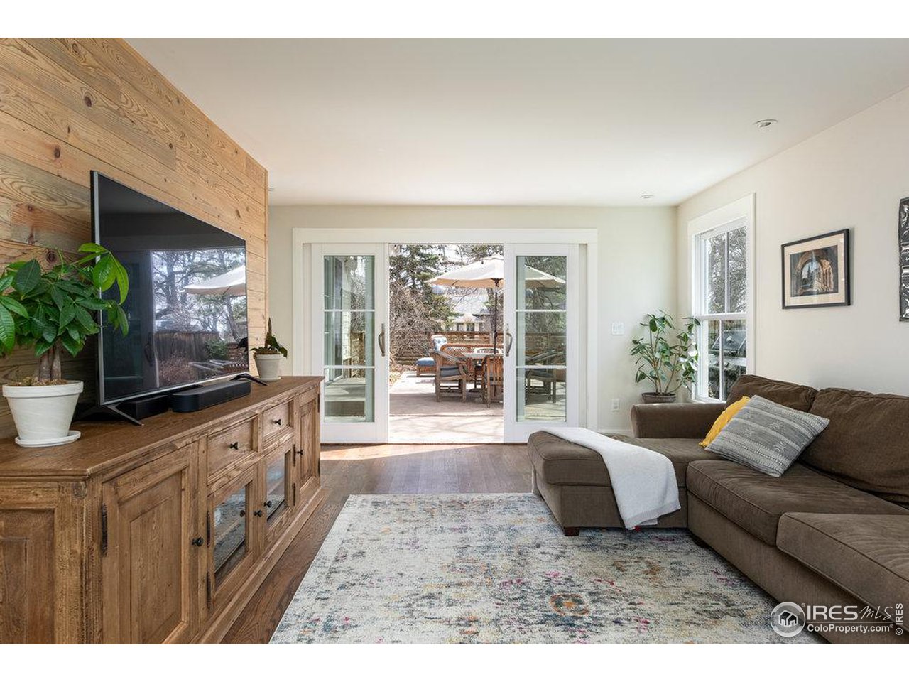 3221 8th Street Boulder, CO 80304 - Photo 31 of 40 a living room with furniture and a large window