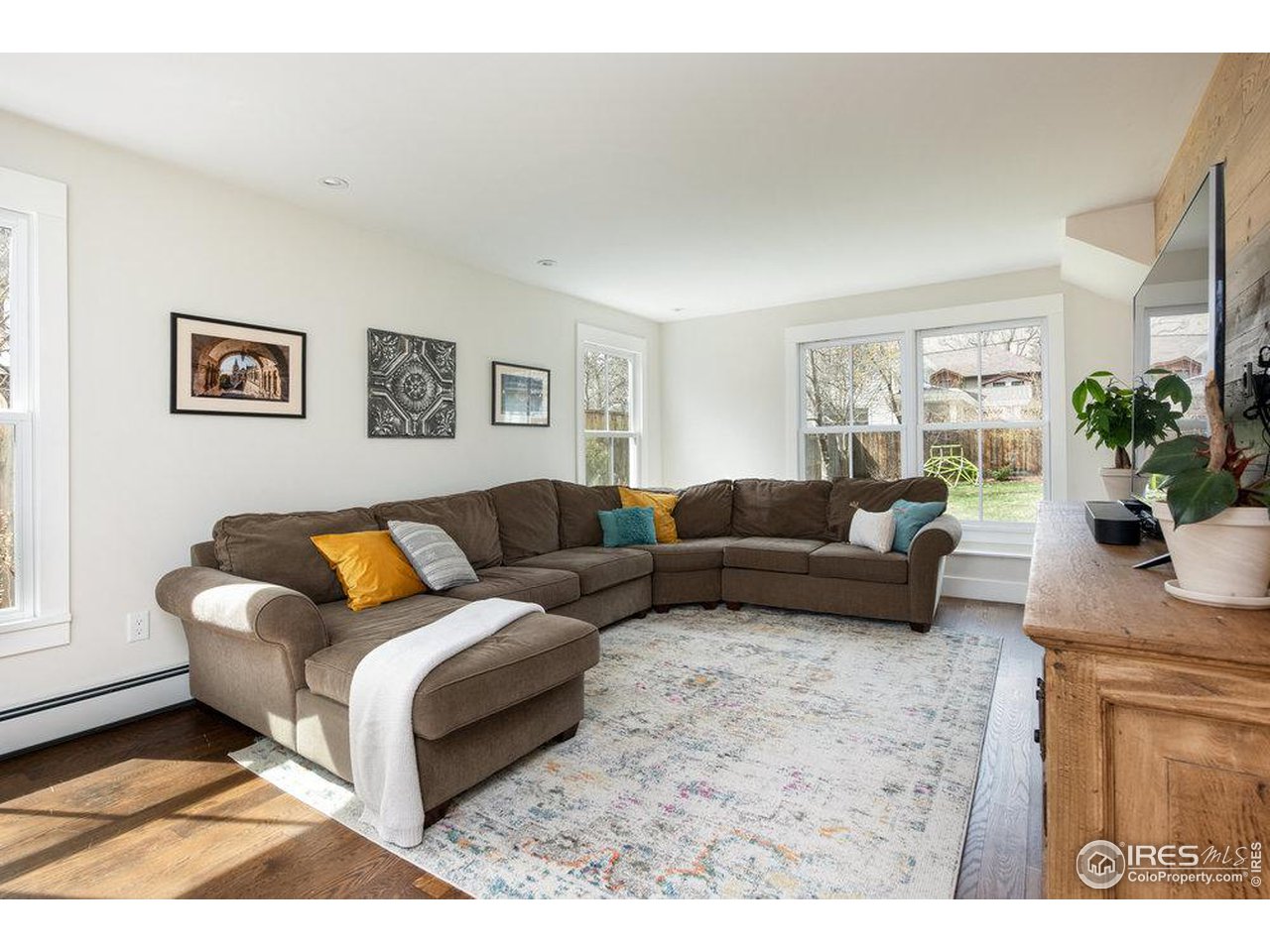 3221 8th Street Boulder, CO 80304 - Photo 32 of 40 a living room with furniture and a couch