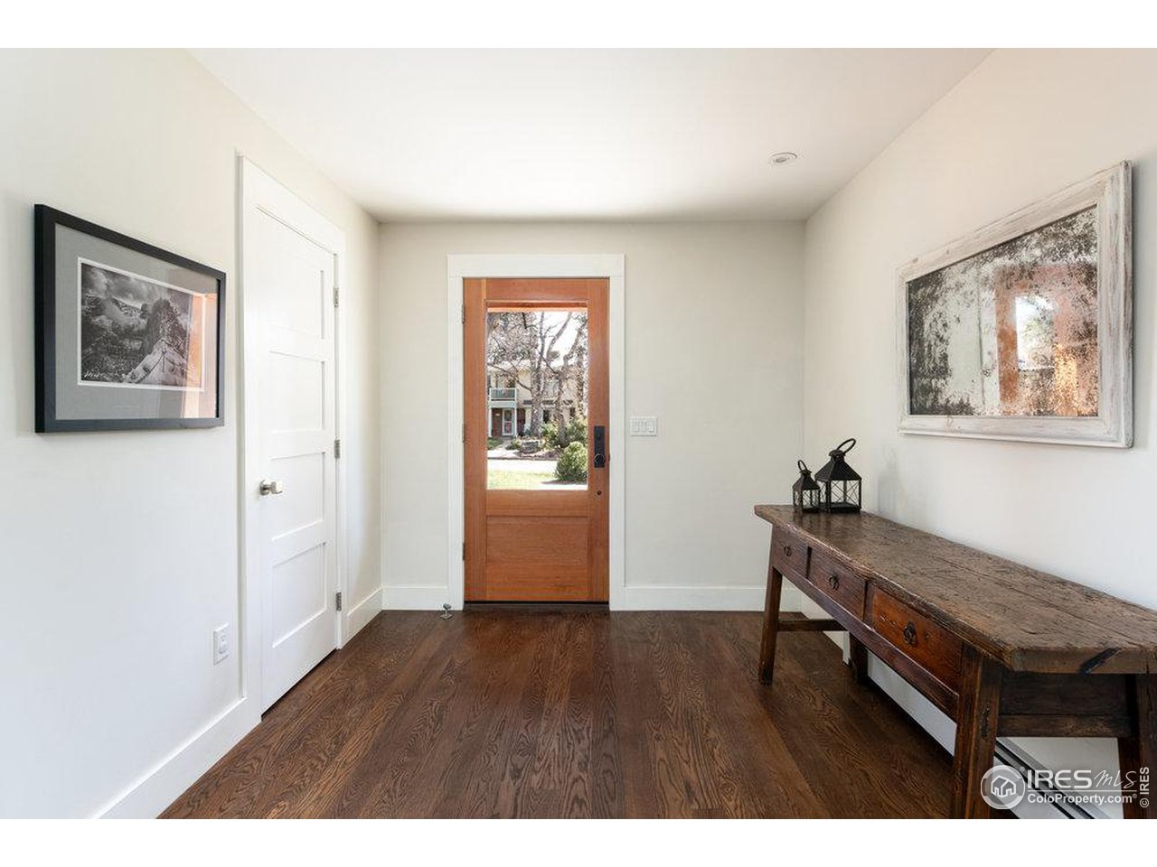 3221 8th Street Boulder, CO 80304 - Photo 4 of 40 a room with furniture and wooden floor
