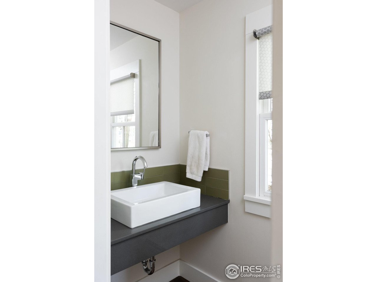 3221 8th Street Boulder, CO 80304 - Photo 6 of 40 a bathroom with a sink and a mirror