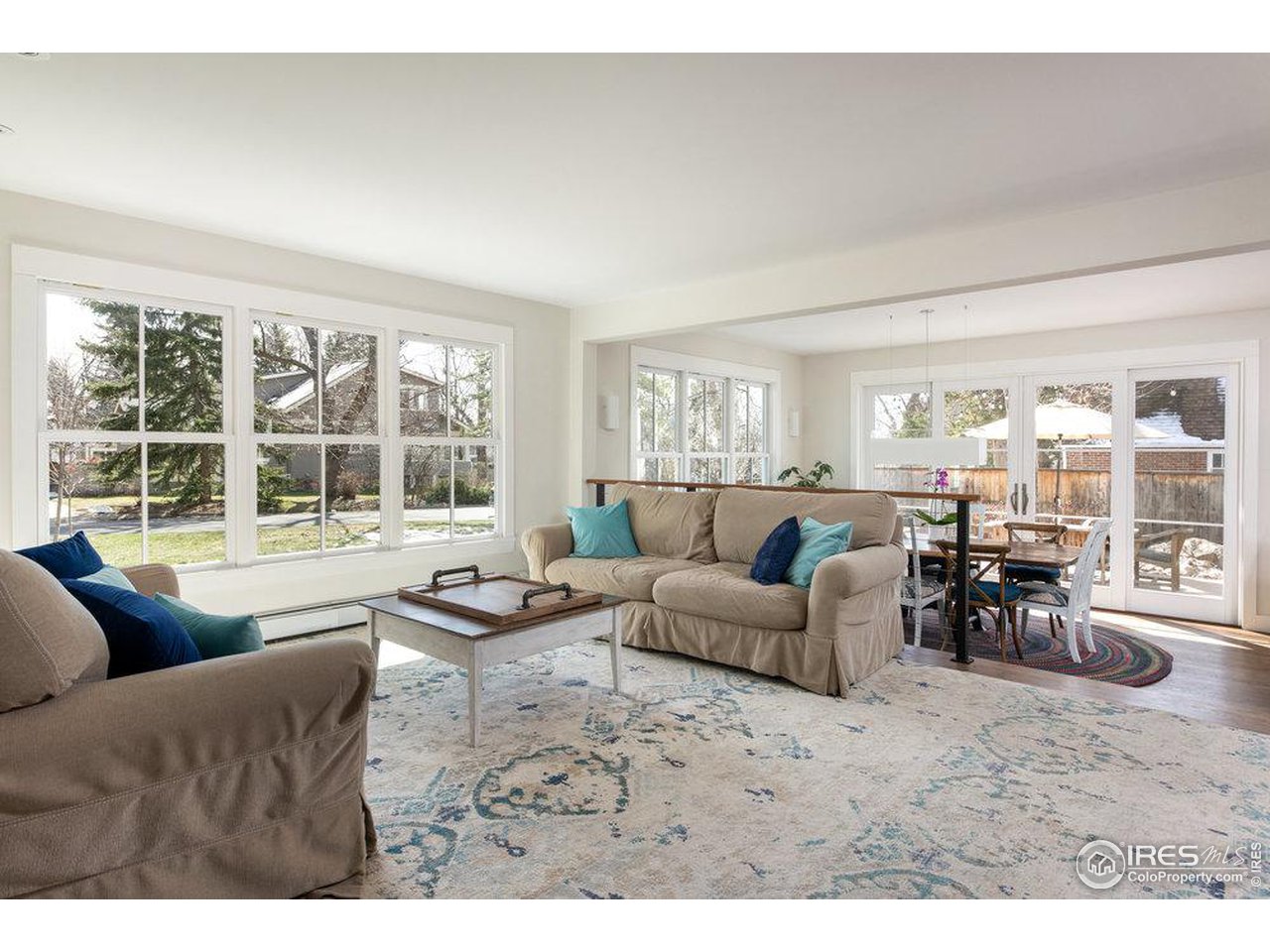3221 8th Street Boulder, CO 80304 - Photo 7 of 40 a living room with furniture and floor to ceiling windows